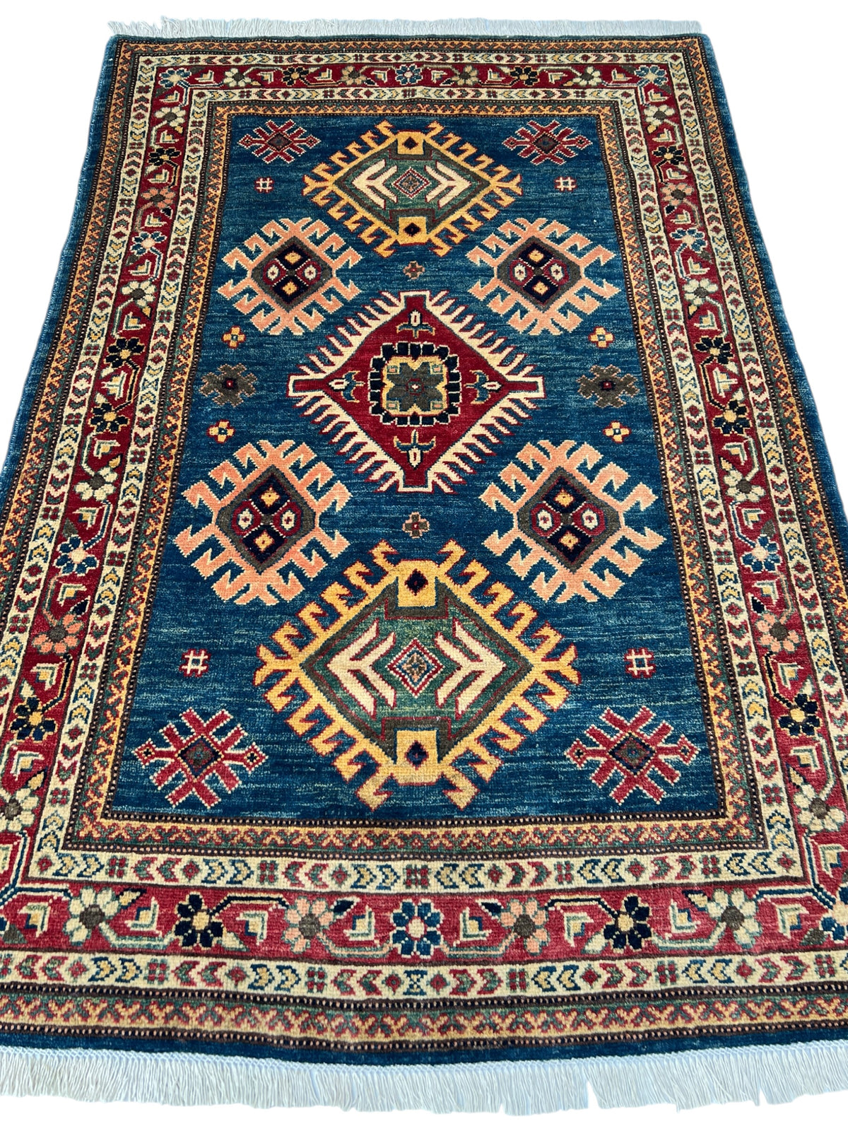 Kazak Rug 4x6 | Navy, Ivory & Red | hand-knotted wool | full view, end