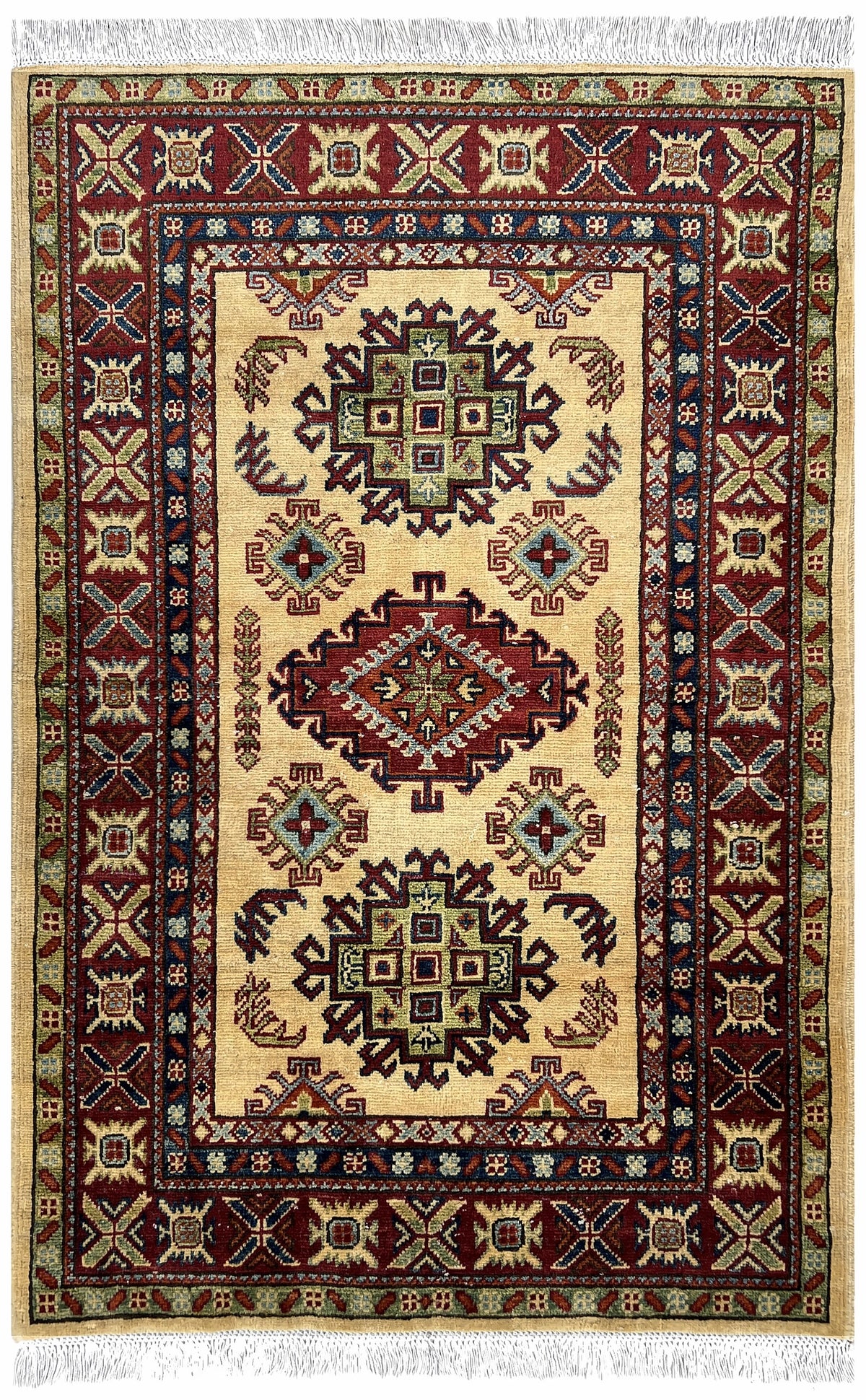 Afghan Kazak Rug 3x5 | ivory field with three tribal medallions inside a red border with navy | medallion design | hand-knotted wool