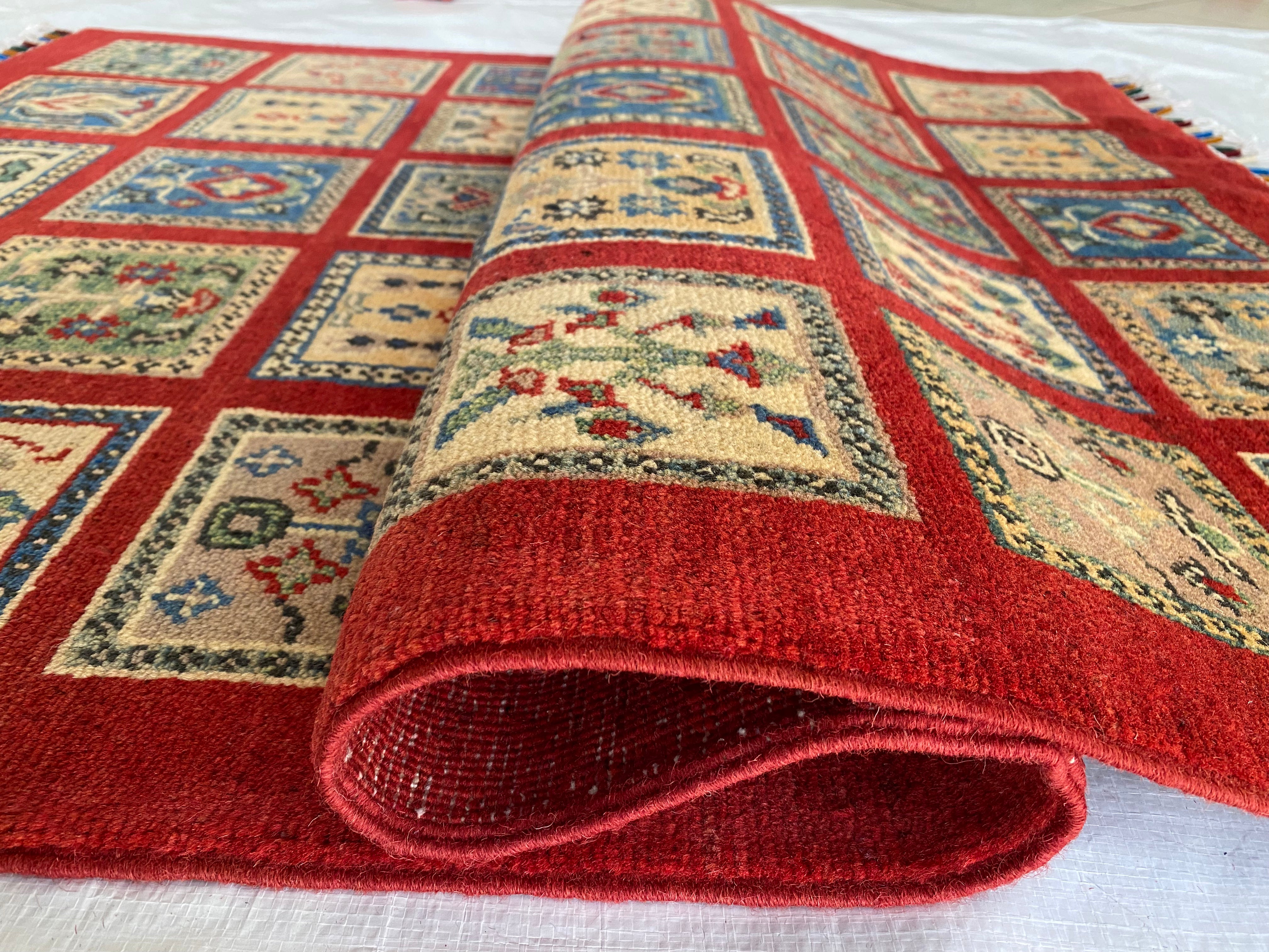 Afghani Rug 4x6 size range tribal Red laid flat