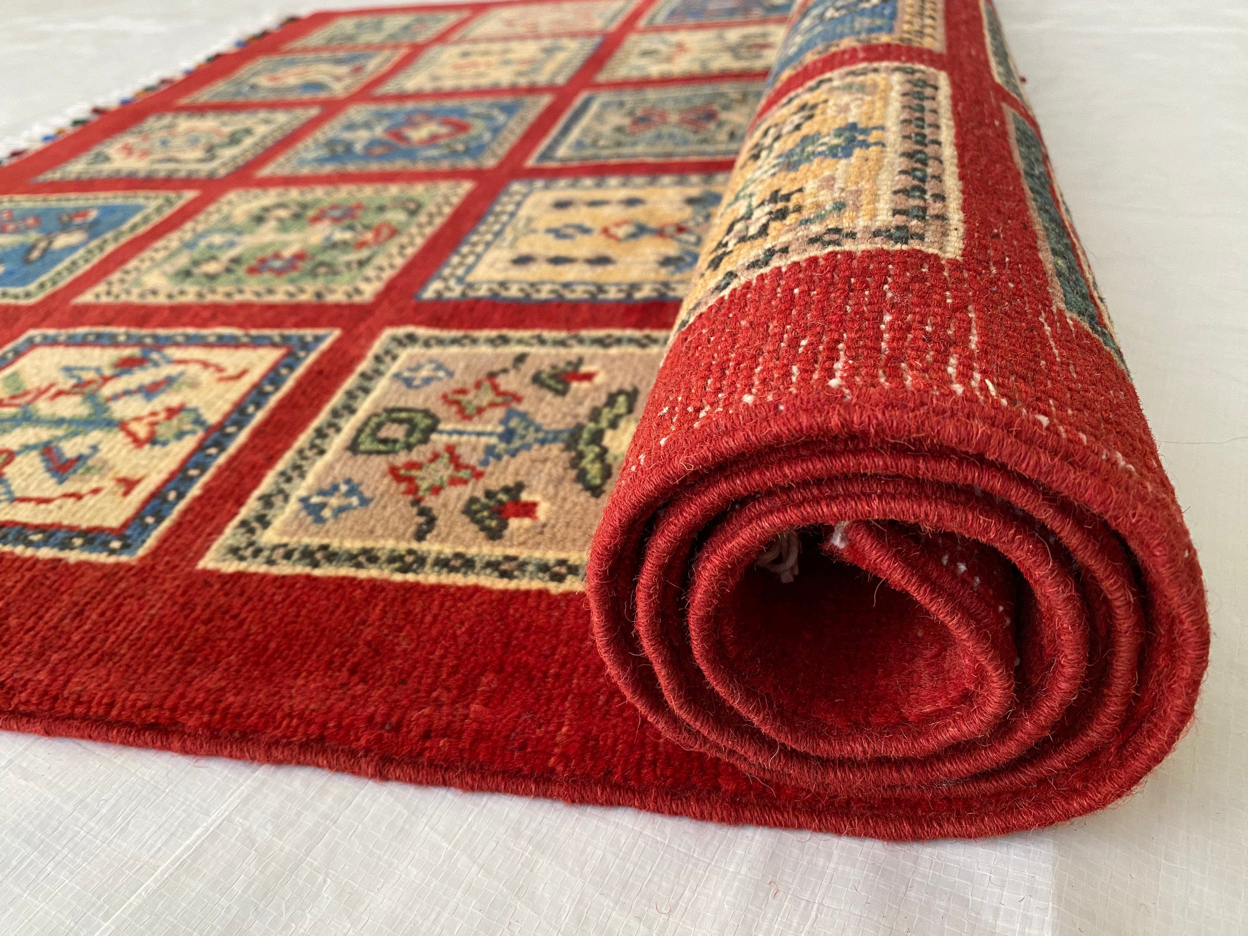 Afghani Rug 4x6 size range tribal Red laid flat