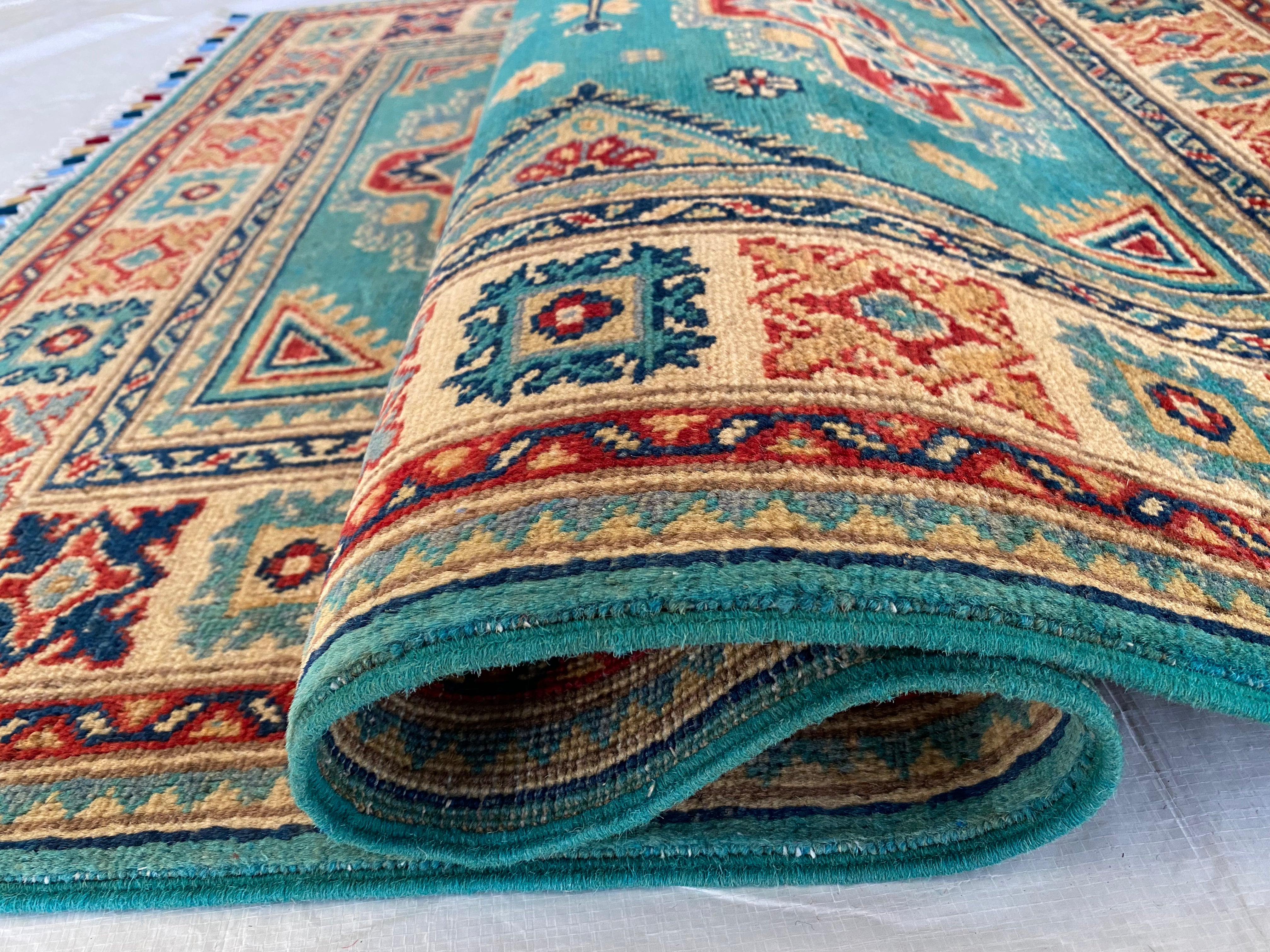 Afghani Rug 4x6 size range tribal Beige Green laid flat