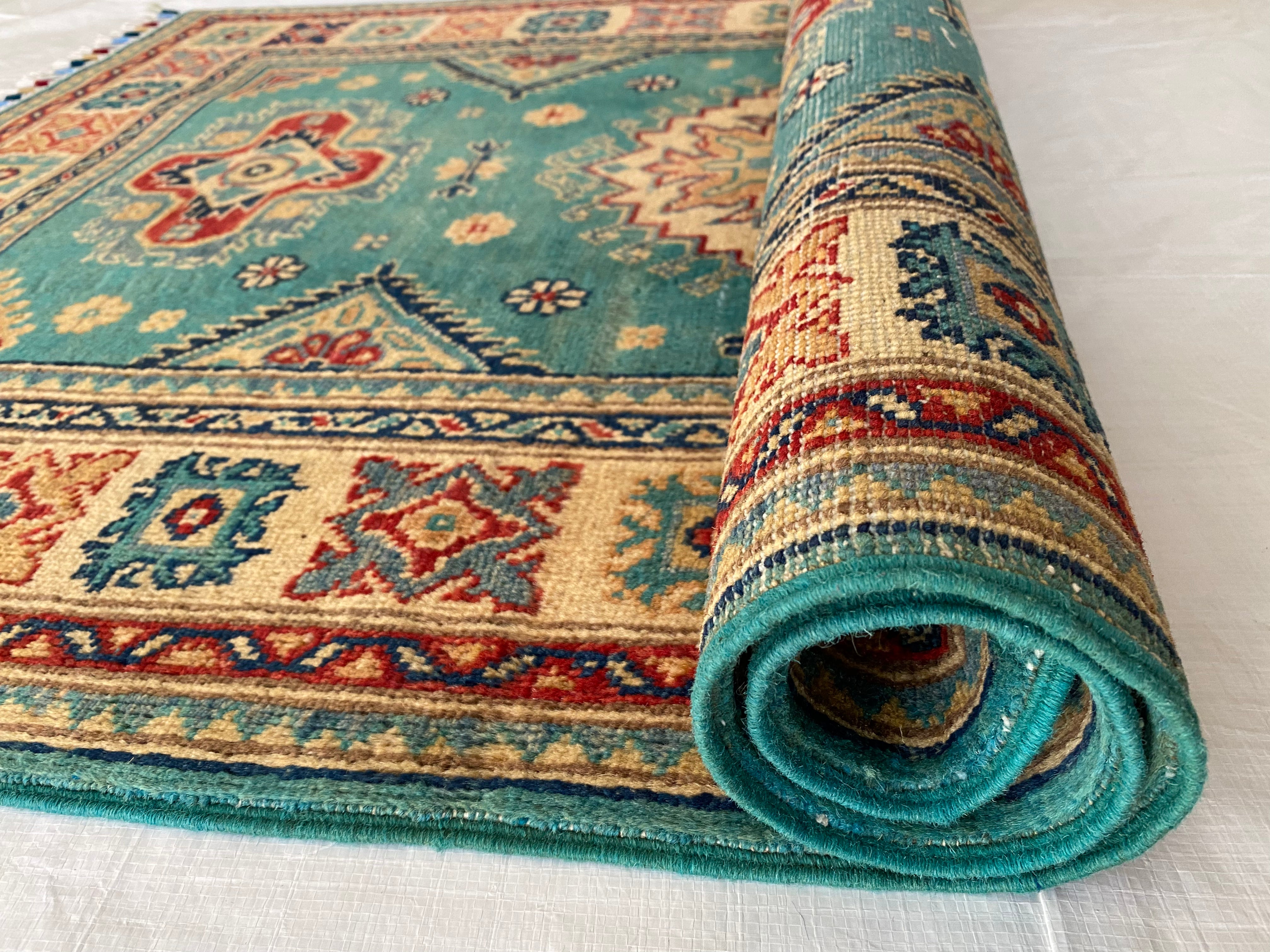 Afghani Rug 4x6 size range tribal Beige Green laid flat