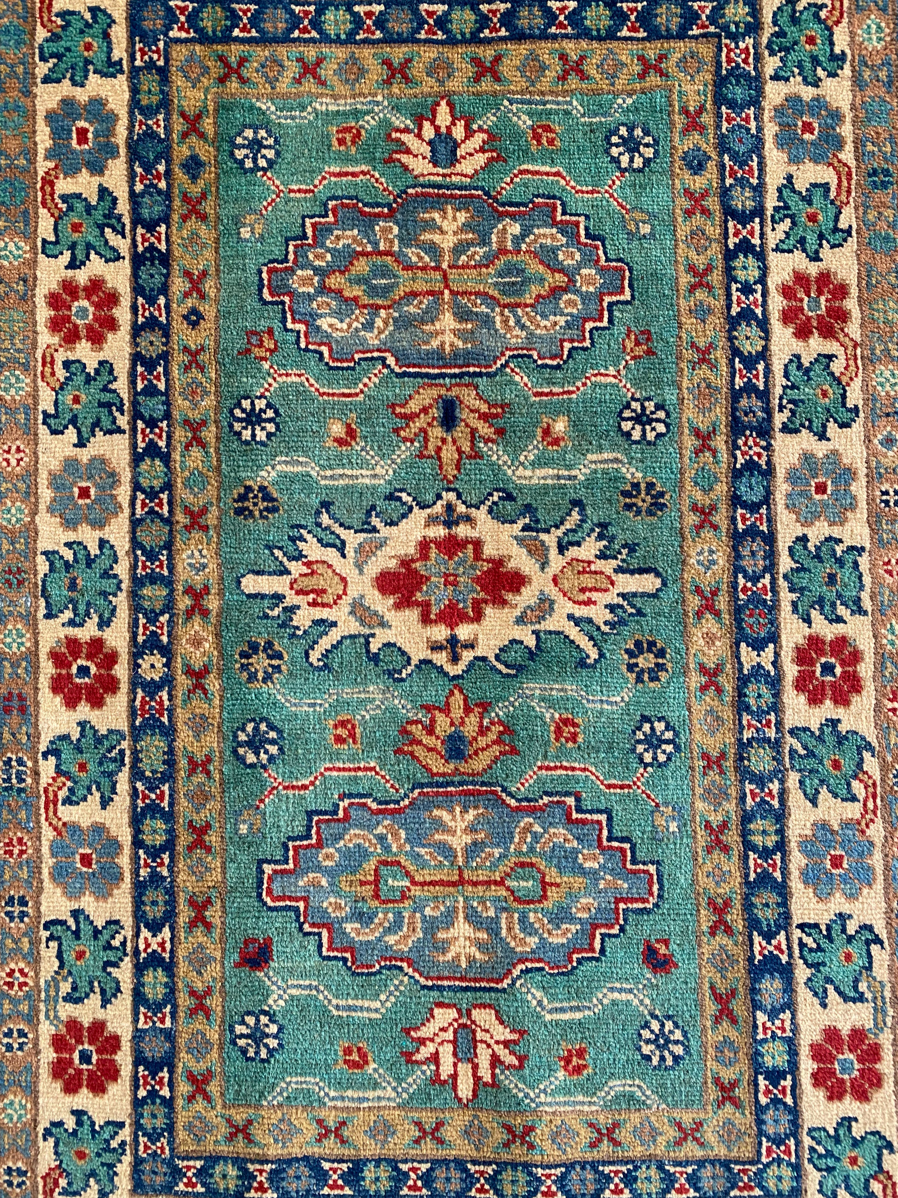 Afghani Rug 3x4 size range tribal Blue Cream laid flat