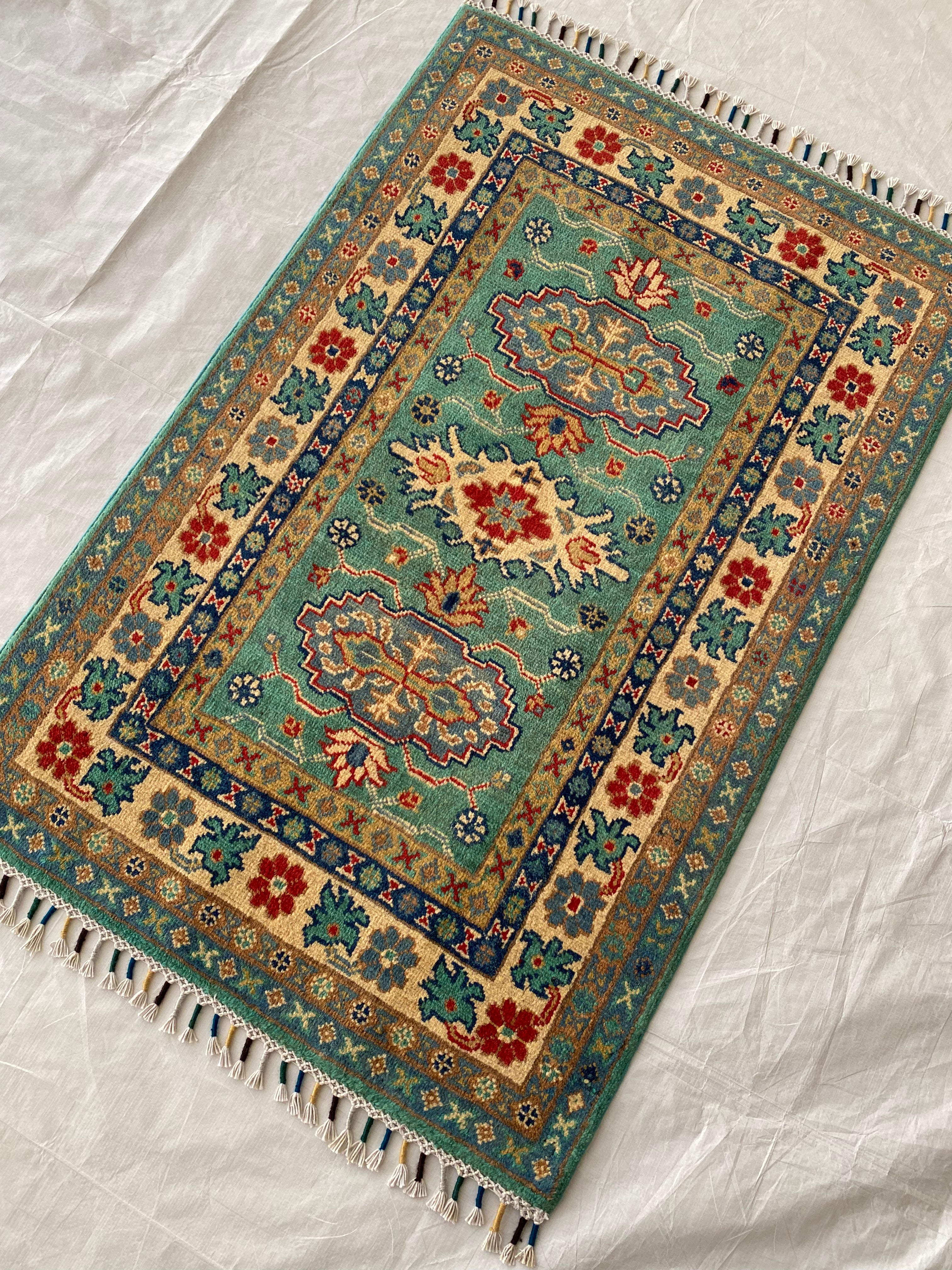 Afghani Rug 3x4 size range tribal Blue Cream laid flat
