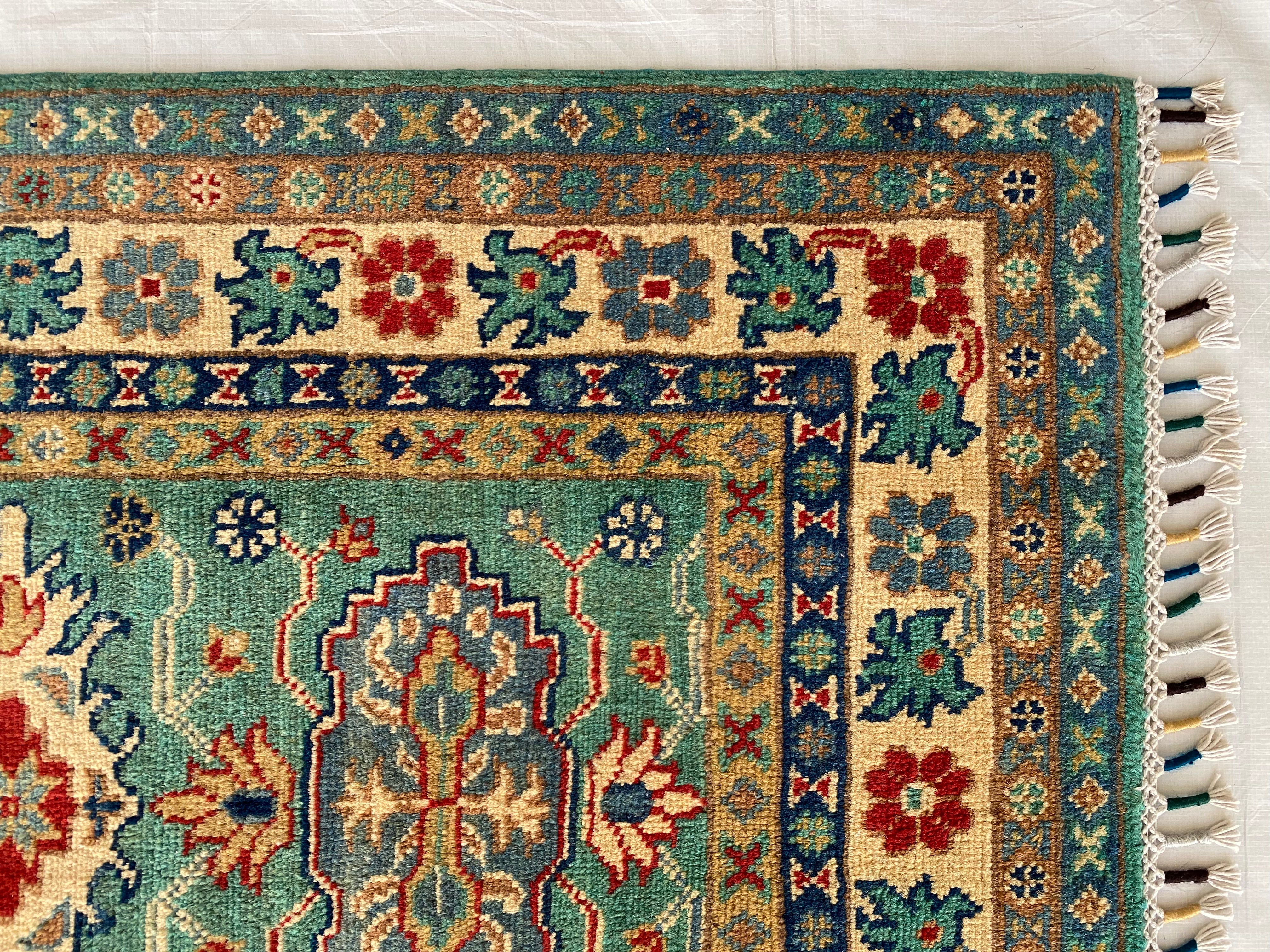 Afghani Rug 3x4 size range tribal Blue Cream laid flat
