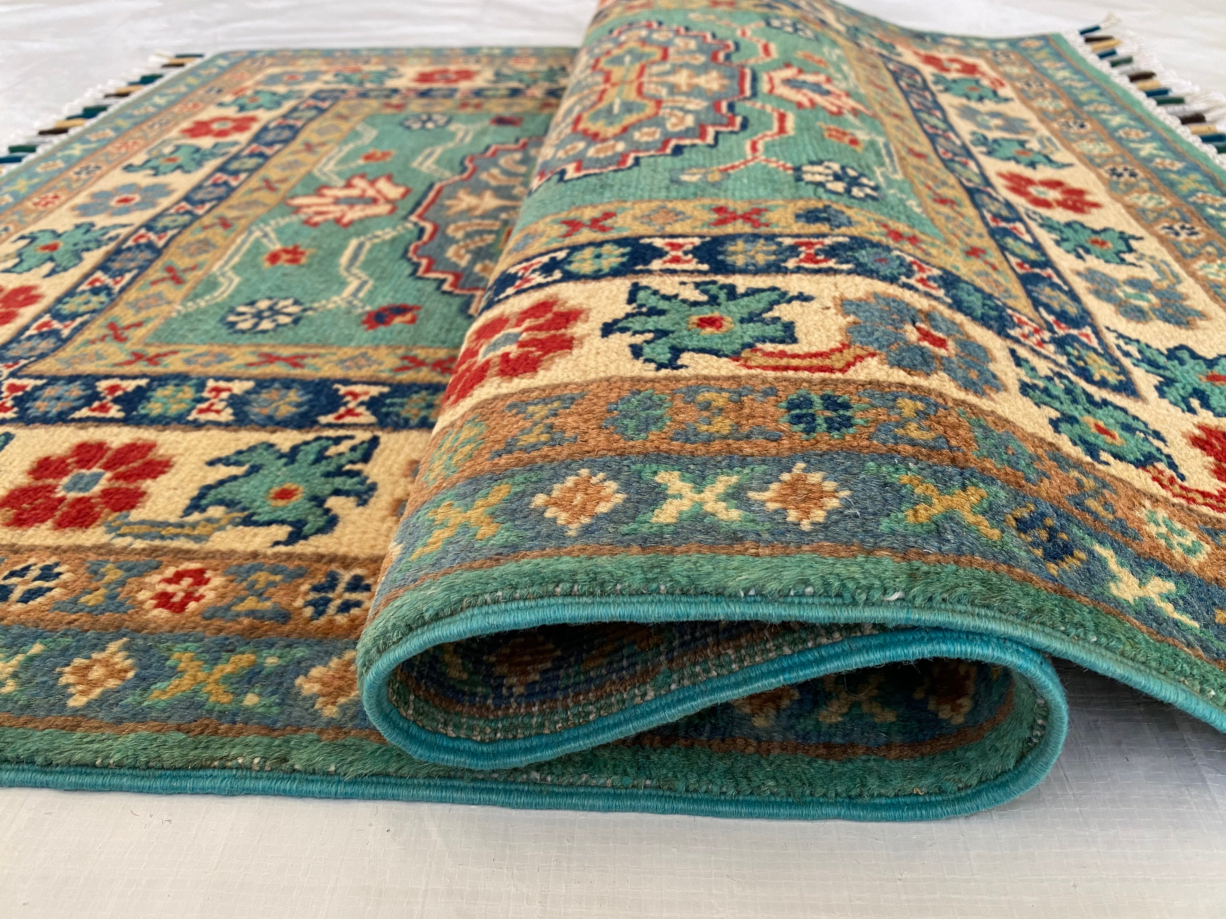 Afghani Rug 3x4 size range tribal Blue Cream laid flat