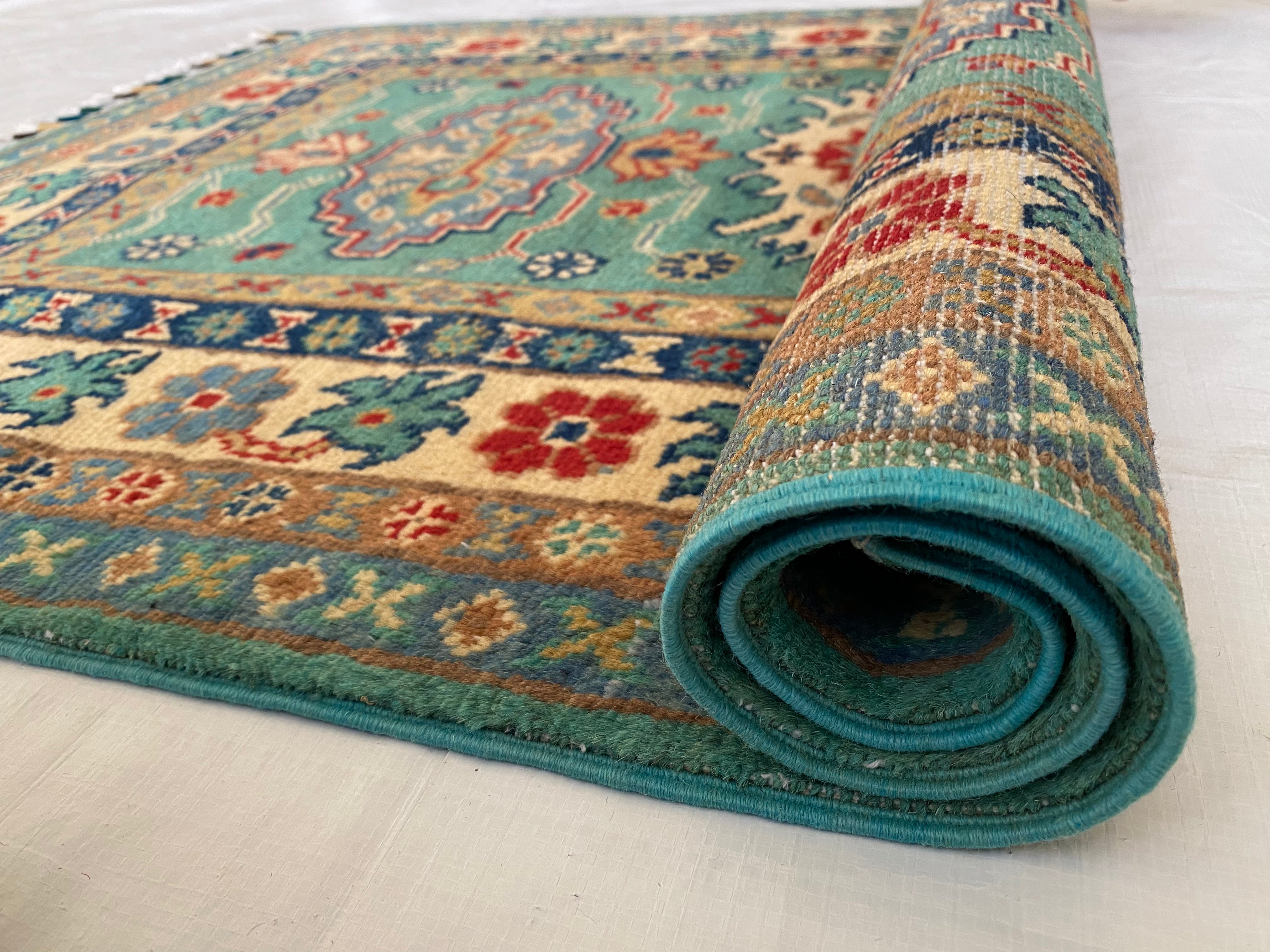 Afghani Rug 3x4 size range tribal Blue Cream laid flat