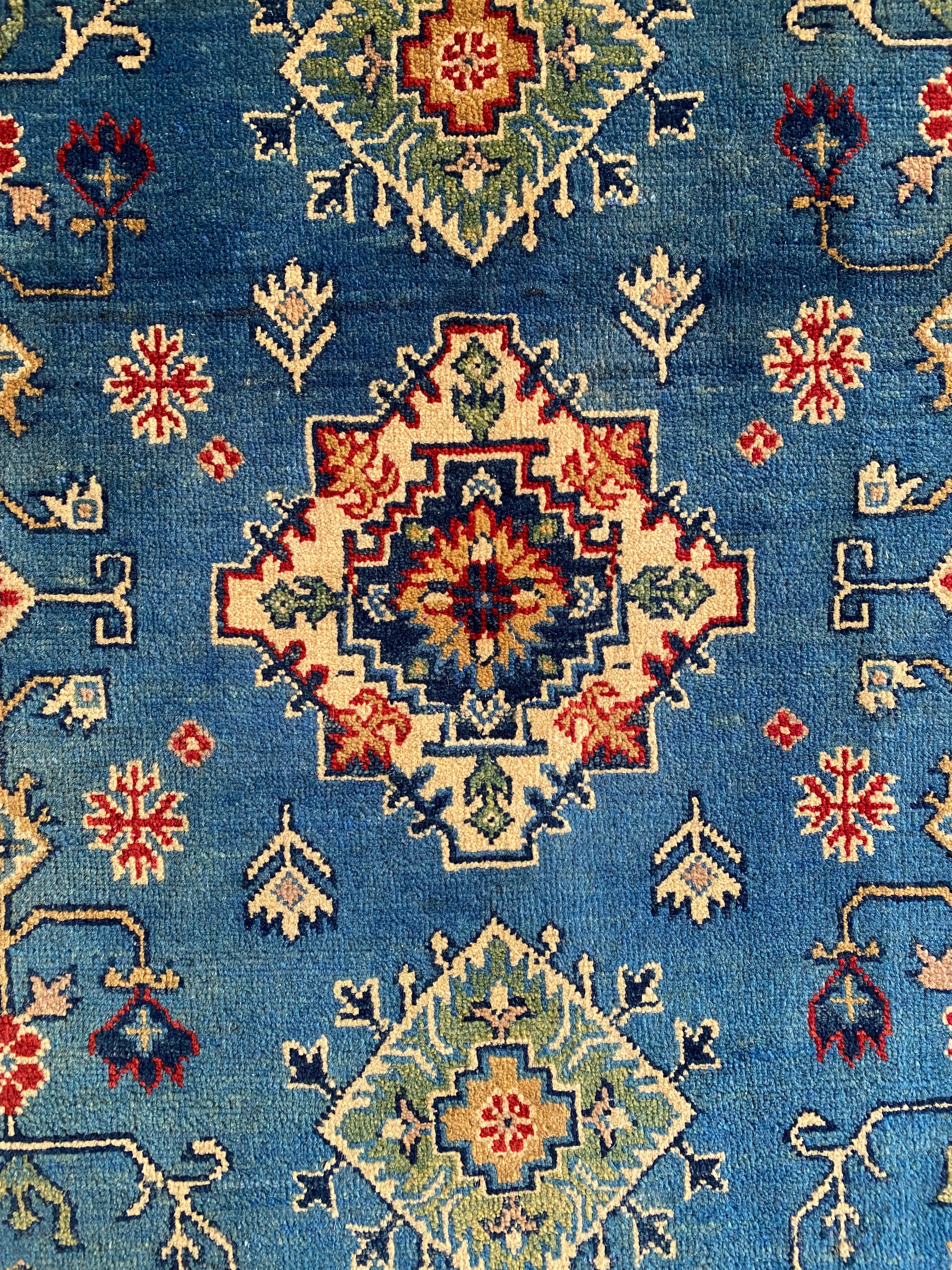 Afghani Rug 4x6 size range tribal Blue laid flat