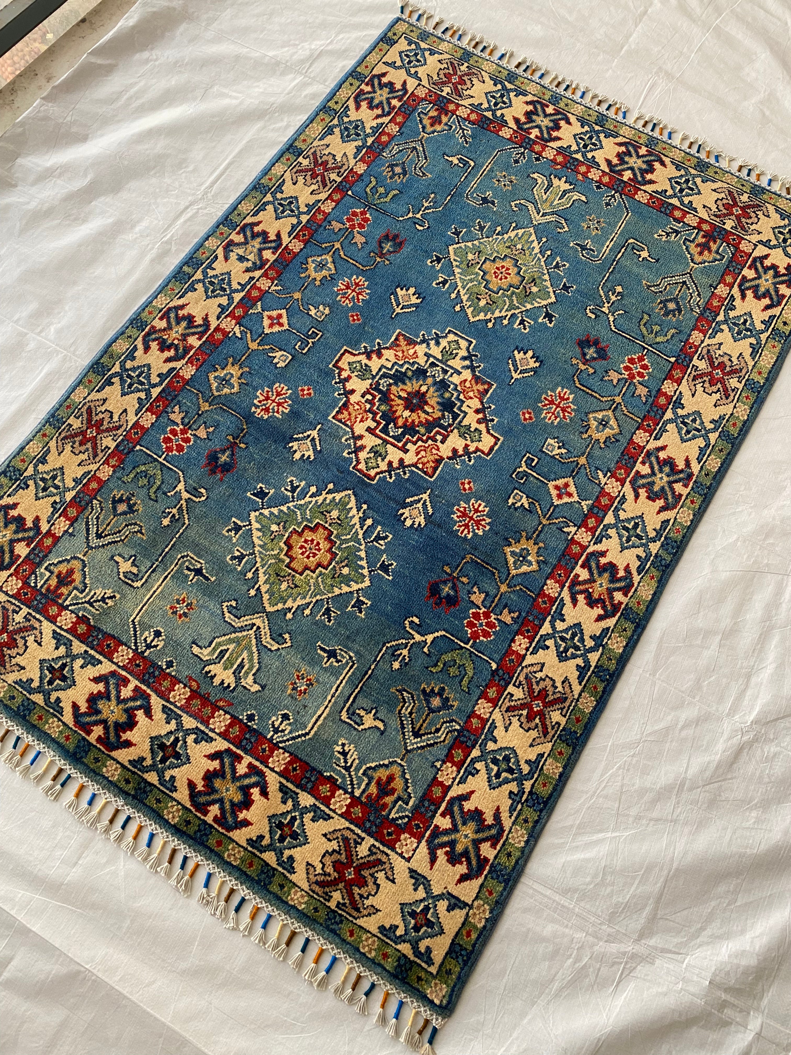 Afghani Rug 4x6 size range tribal Blue laid flat