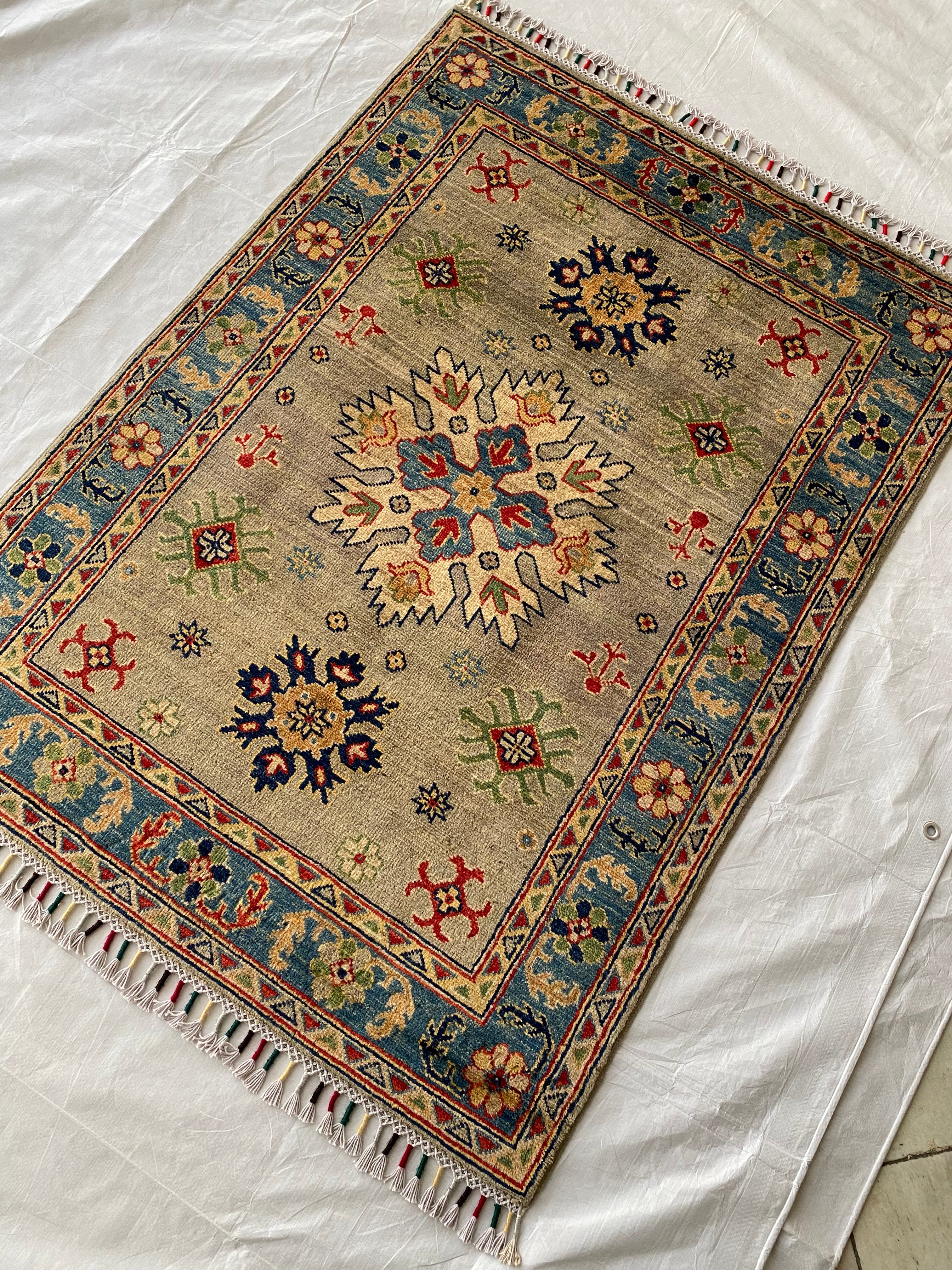 Afghani Rug 4x6 size range tribal Blue Green laid flat