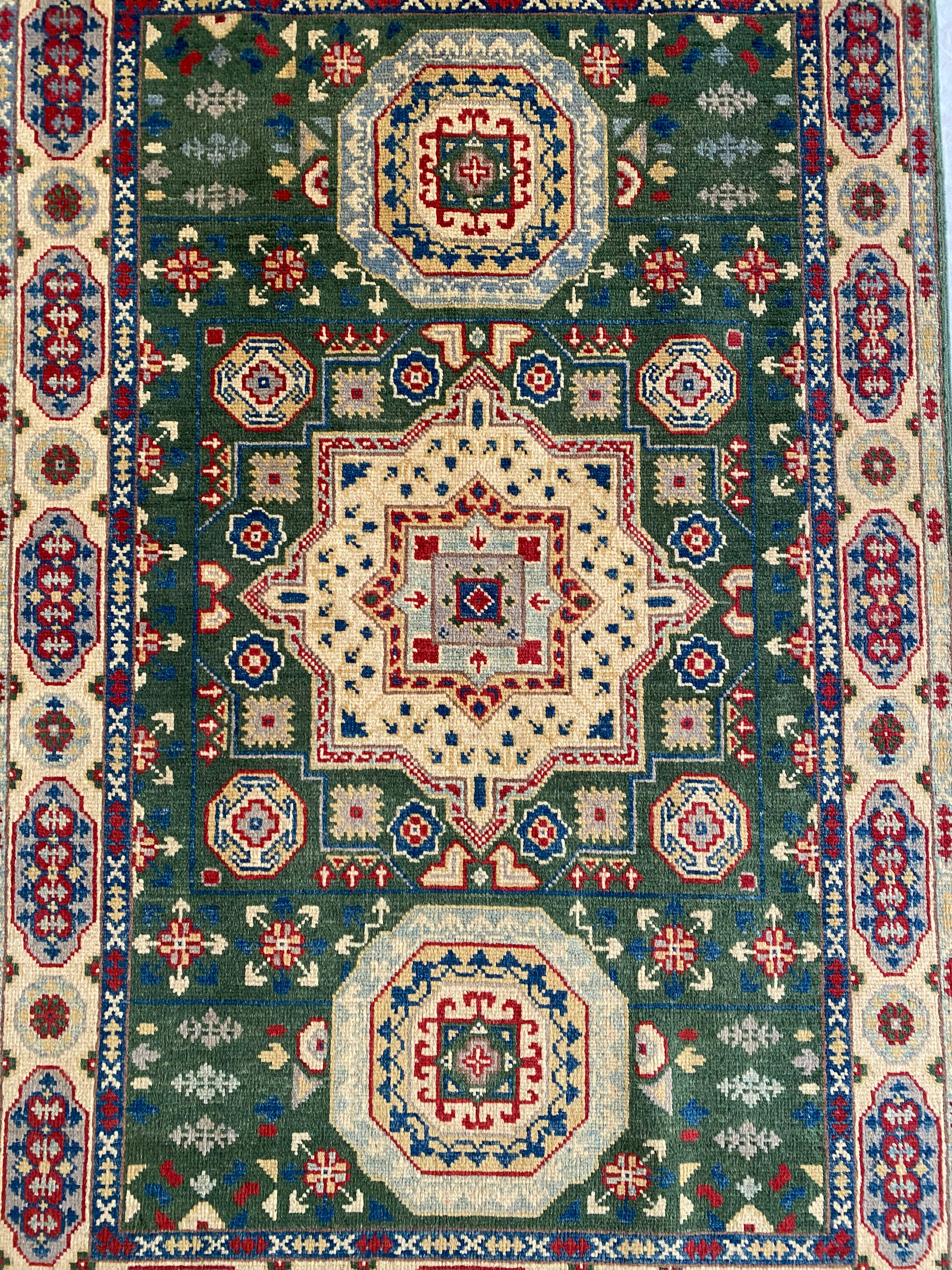 Afghani Rug 4x6 size range tribal Beige Green laid flat