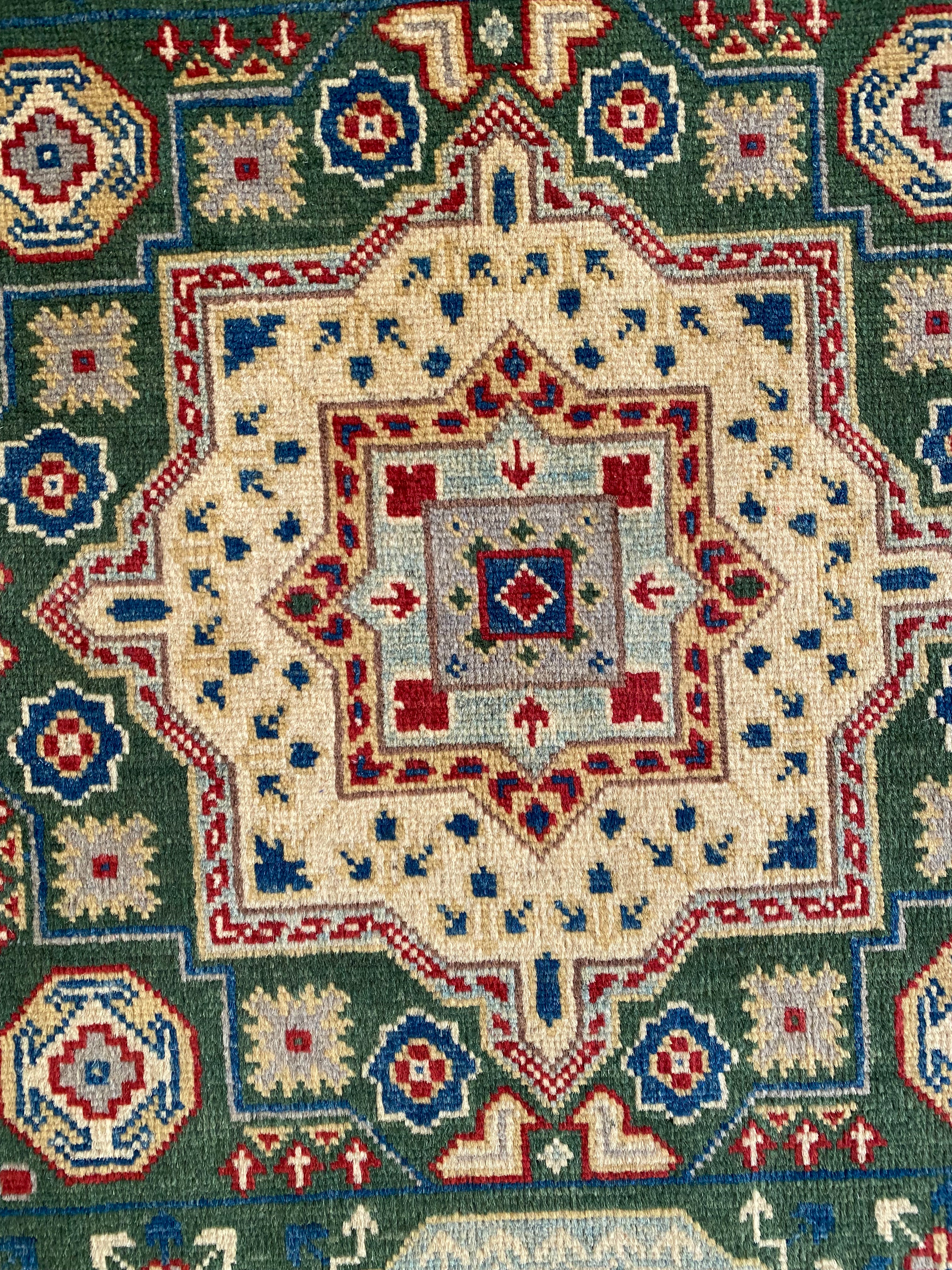Afghani Rug 4x6 size range tribal Beige Green laid flat