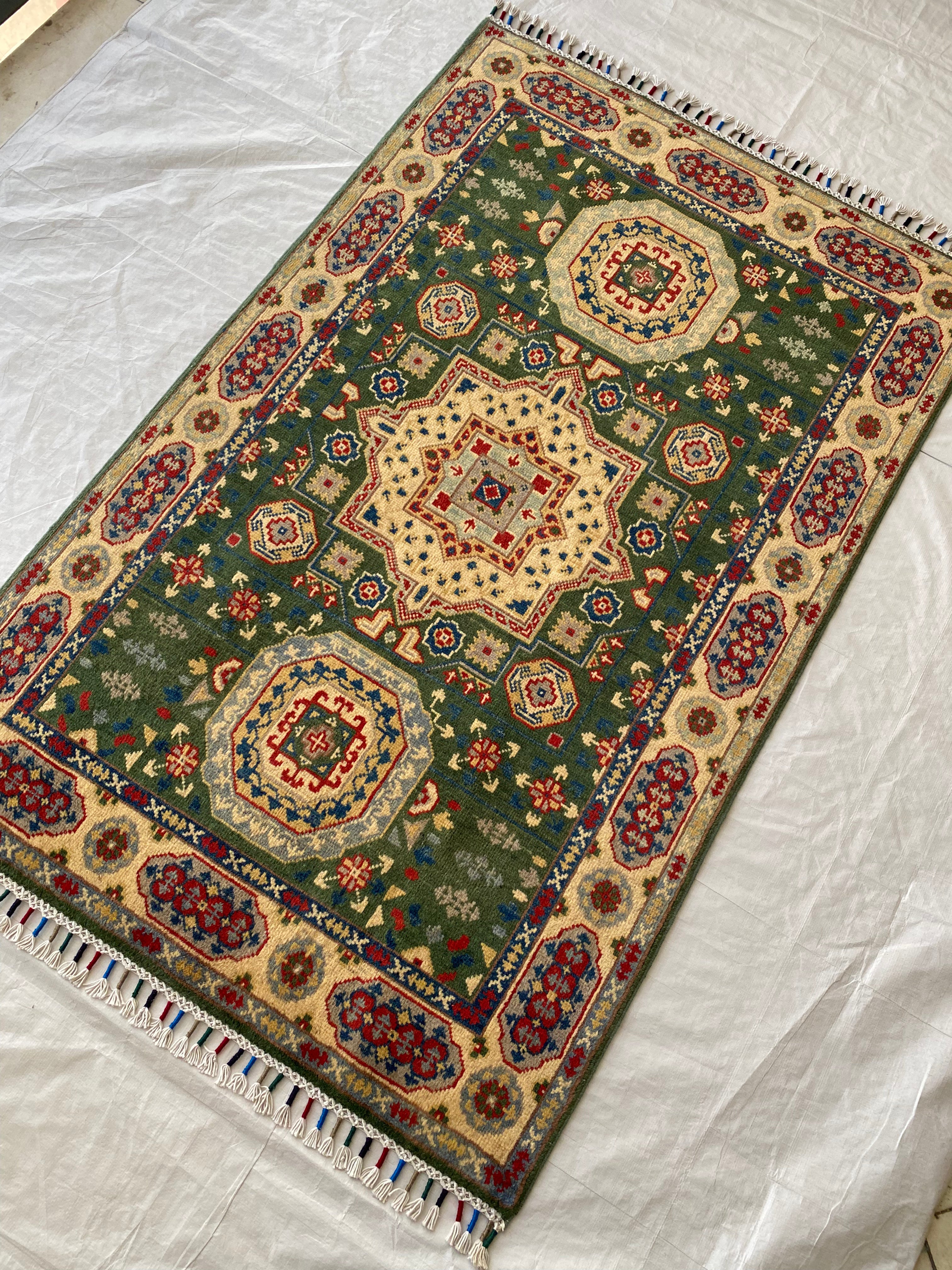 Afghani Rug 4x6 size range tribal Beige Green laid flat