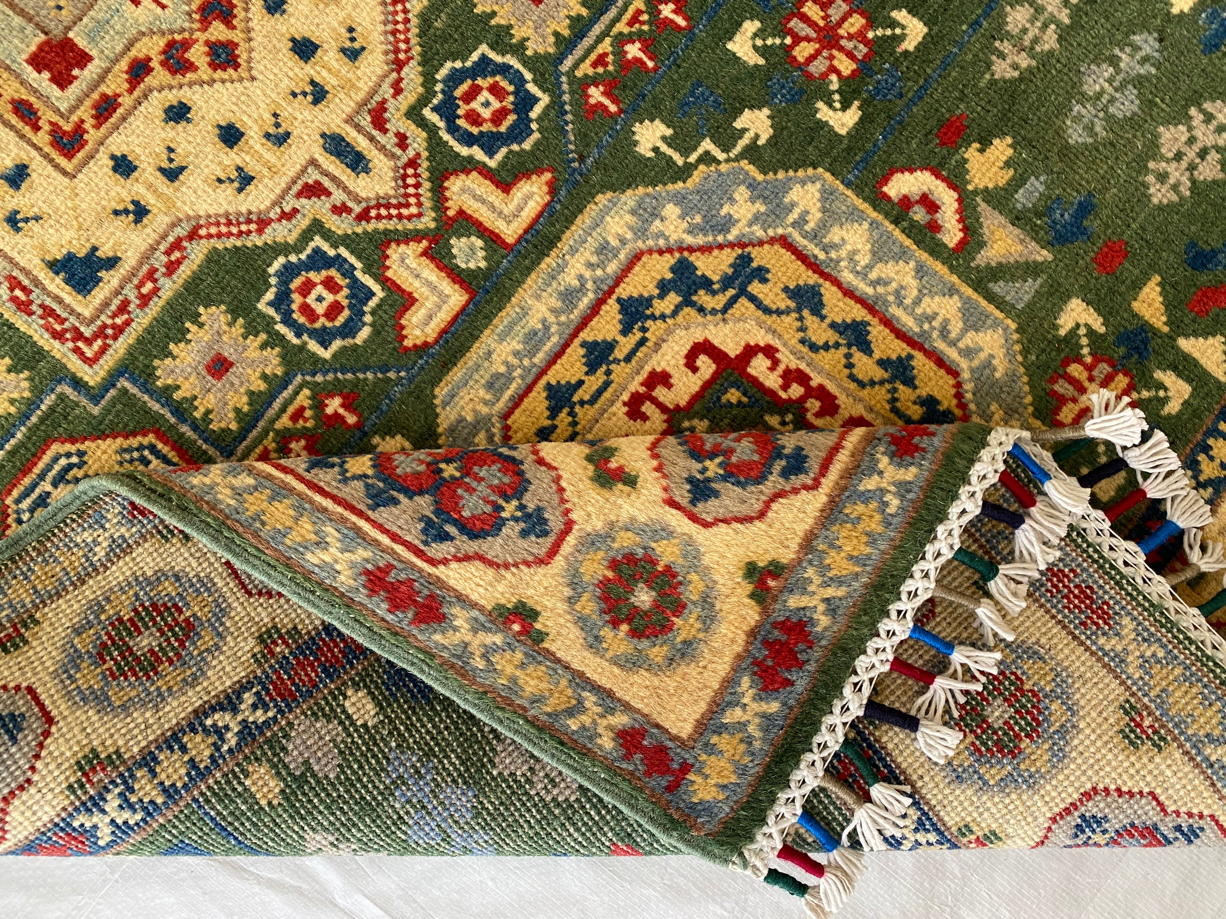 Afghani Rug 4x6 size range tribal Beige Green laid flat