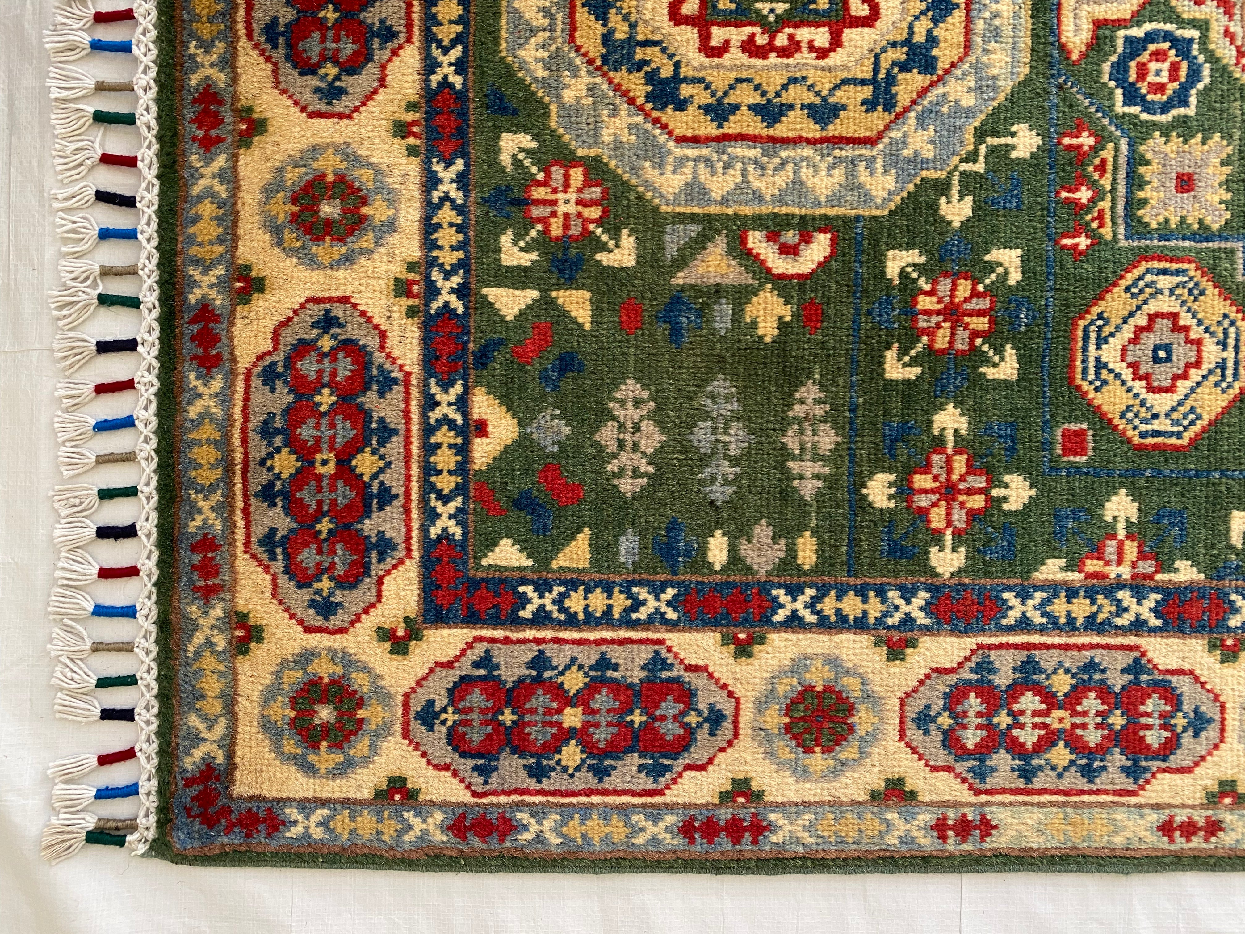 Afghani Rug 4x6 size range tribal Beige Green laid flat