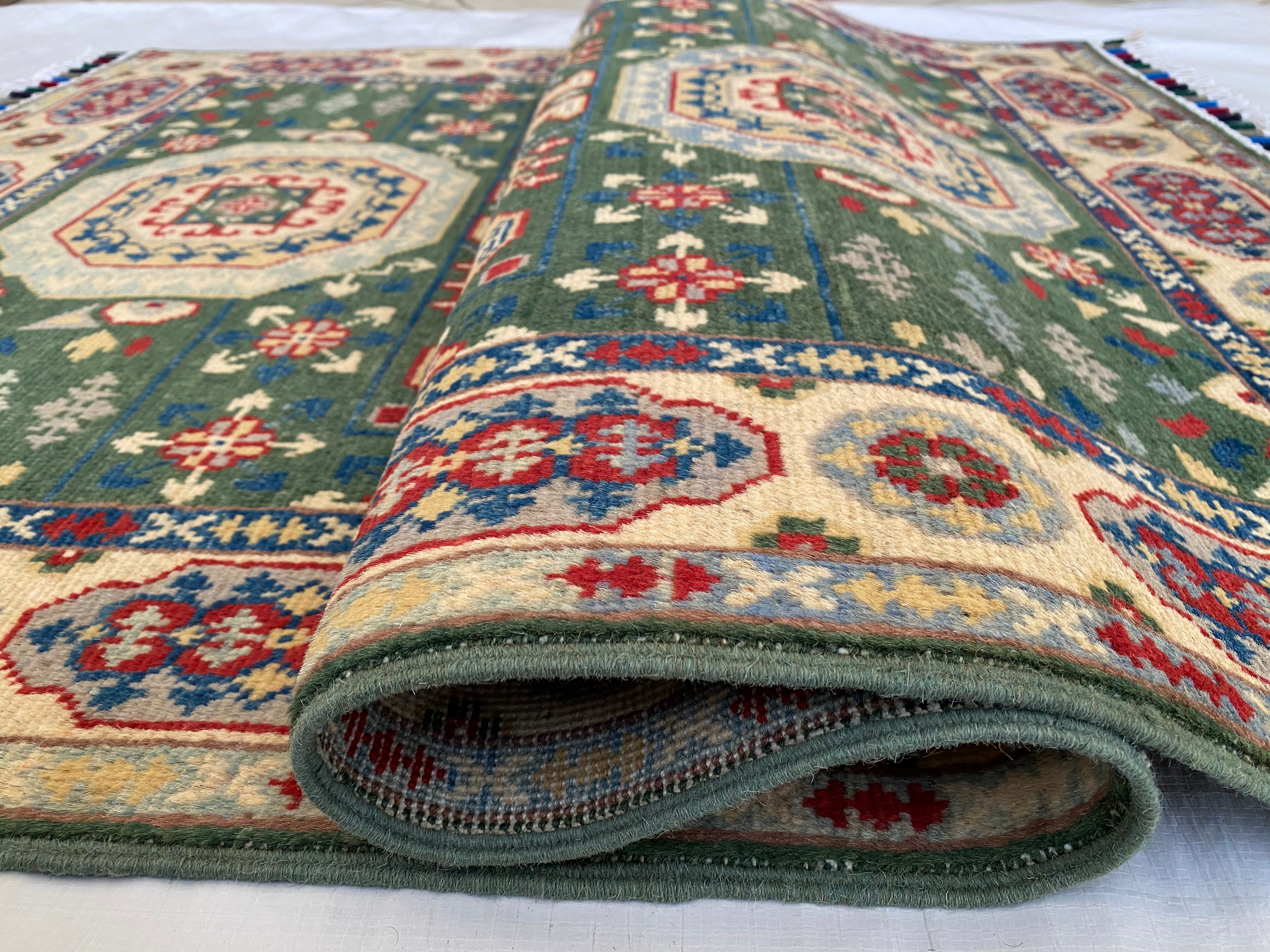 Afghani Rug 4x6 size range tribal Beige Green laid flat