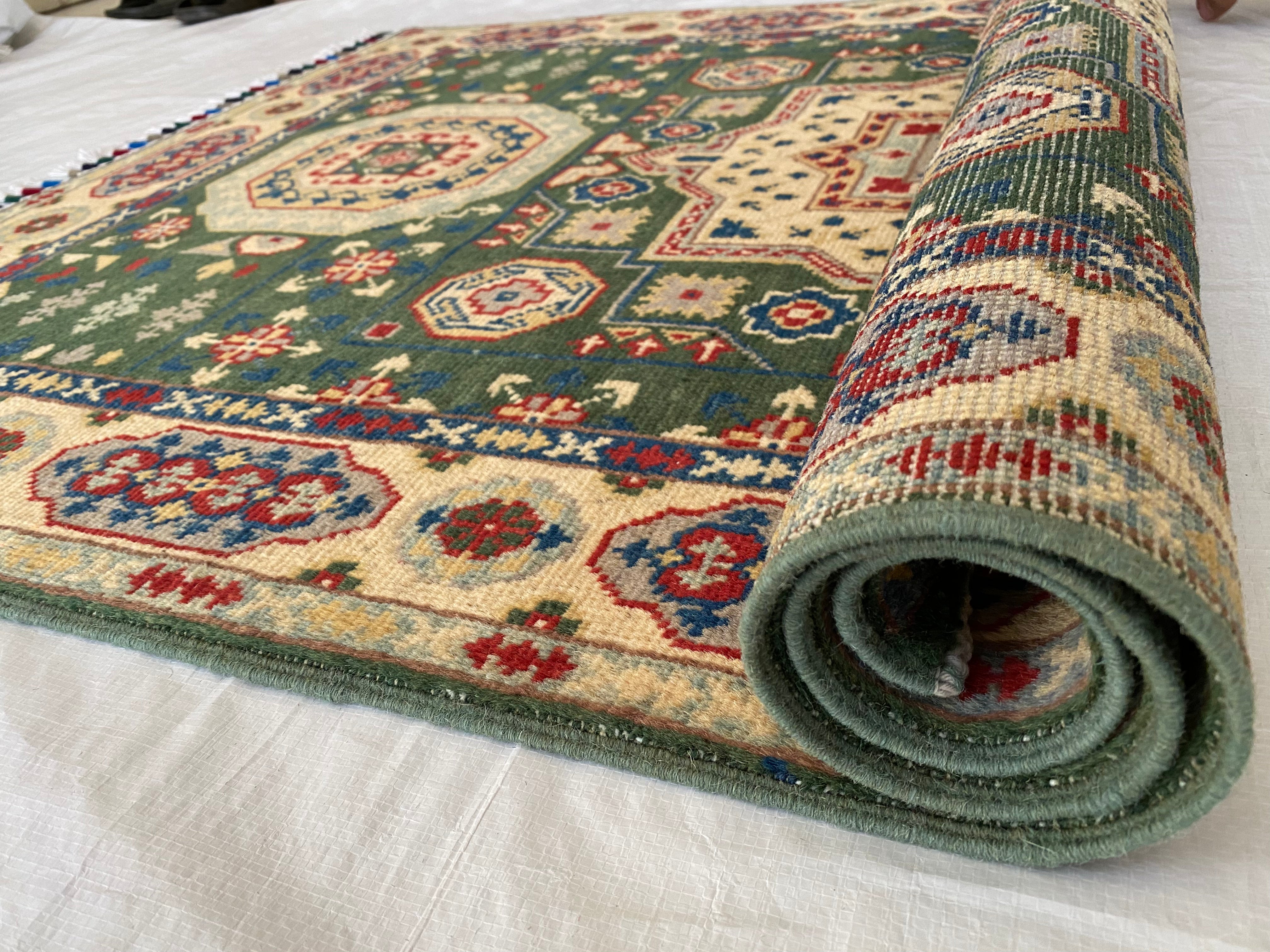 Afghani Rug 4x6 size range tribal Beige Green laid flat