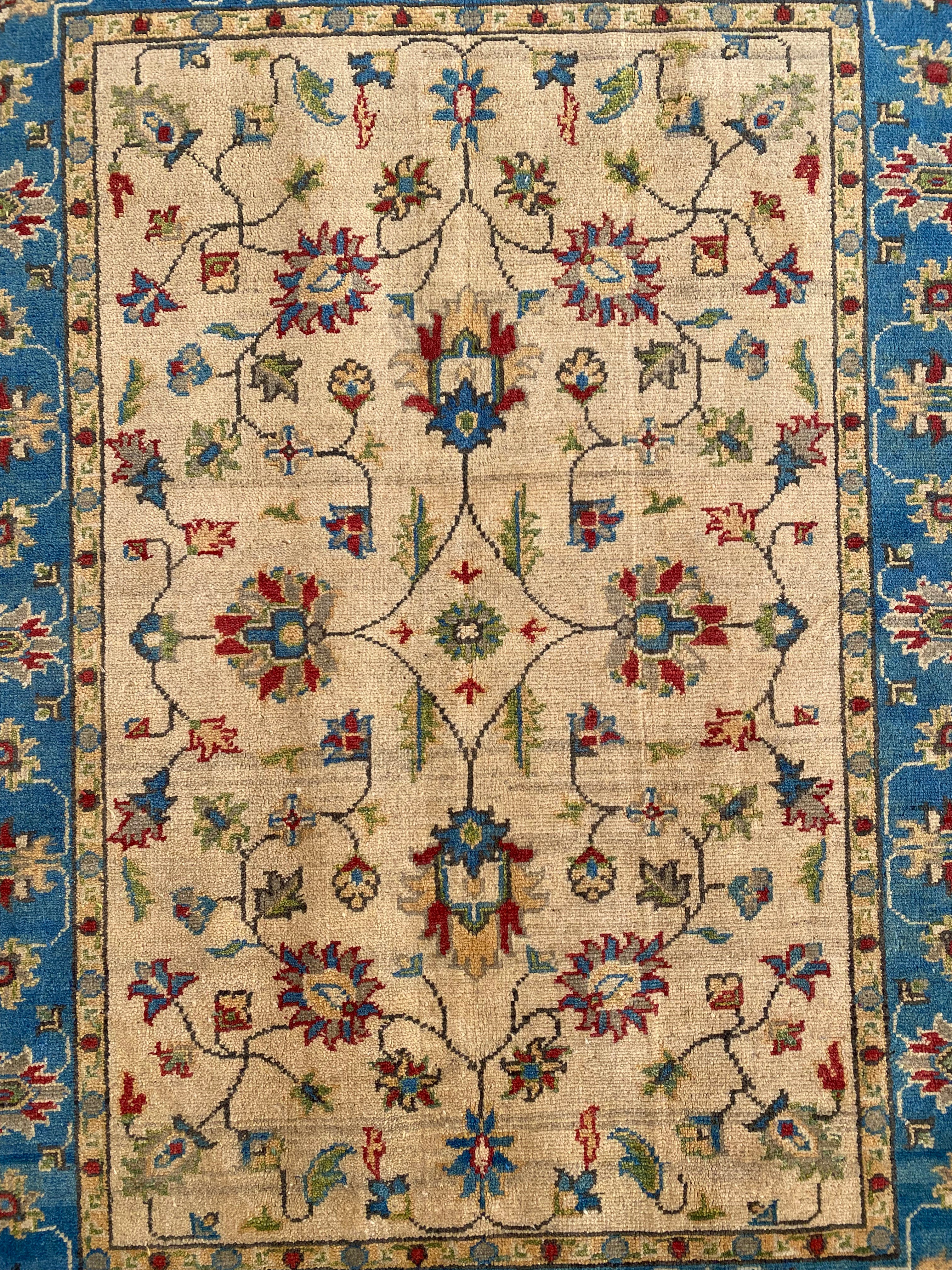 Afghani Rug 4x6 size range tribal Blue Cream laid flat
