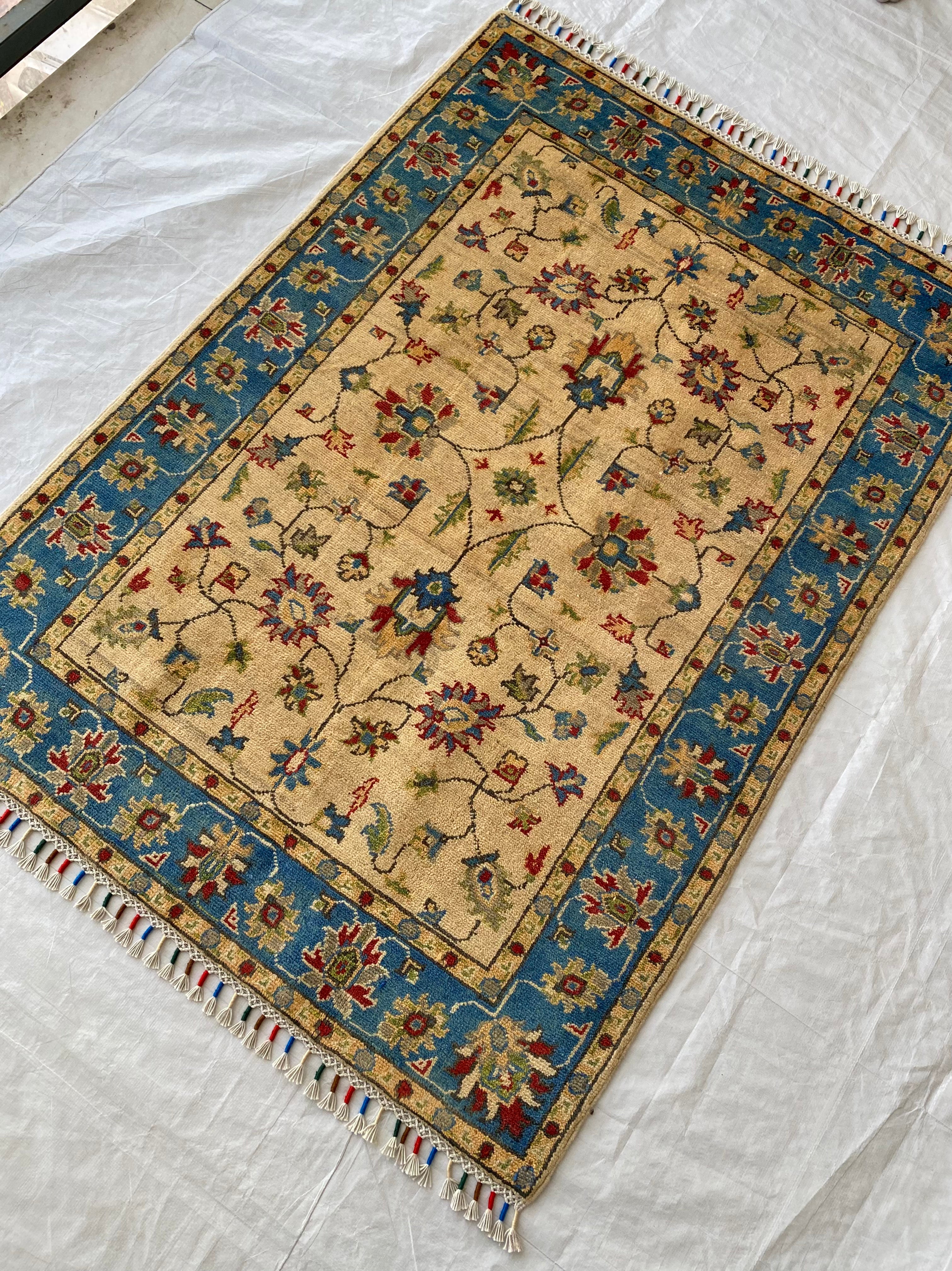 Afghani Rug 4x6 size range tribal Blue Cream laid flat