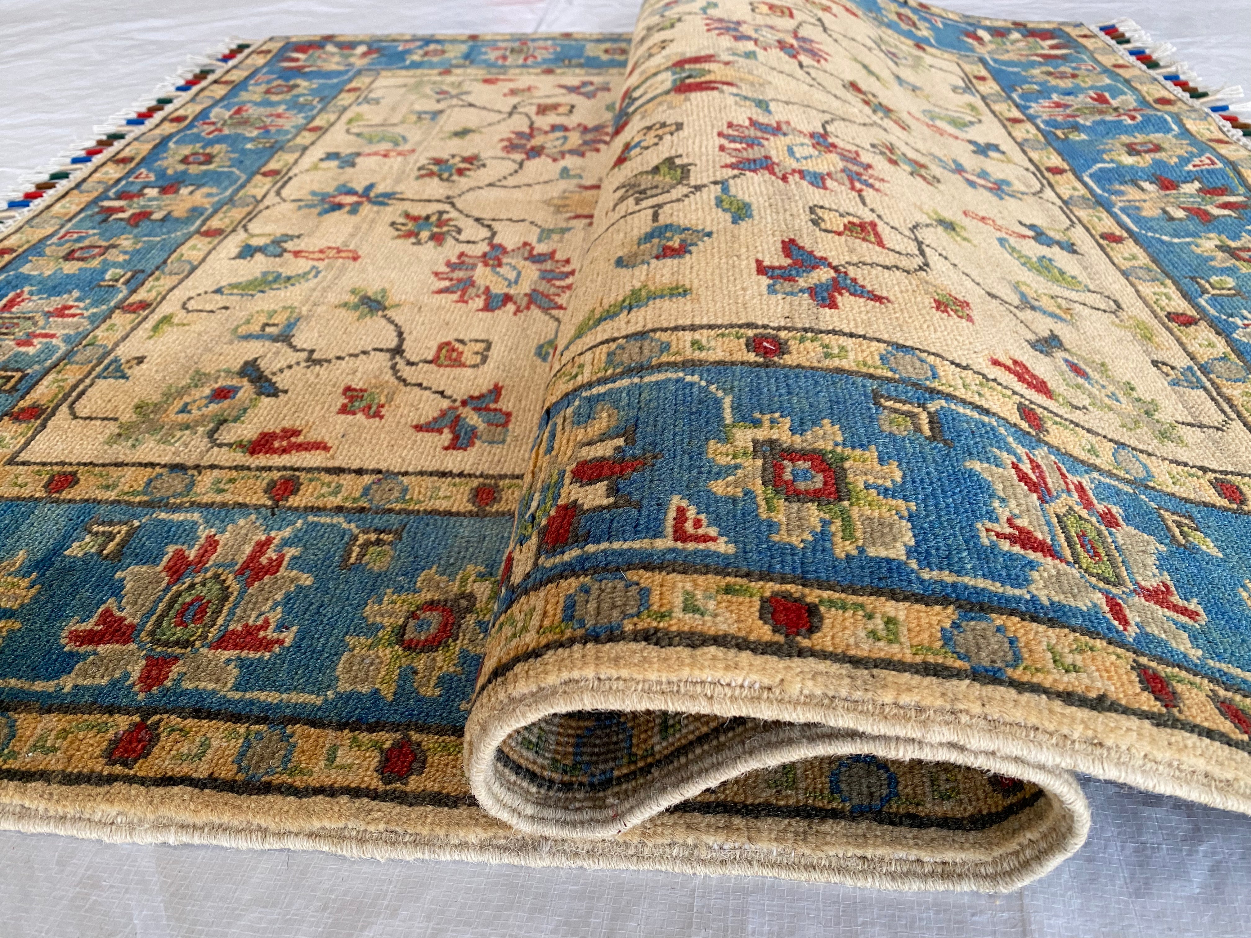 Afghani Rug 4x6 size range tribal Blue Cream laid flat