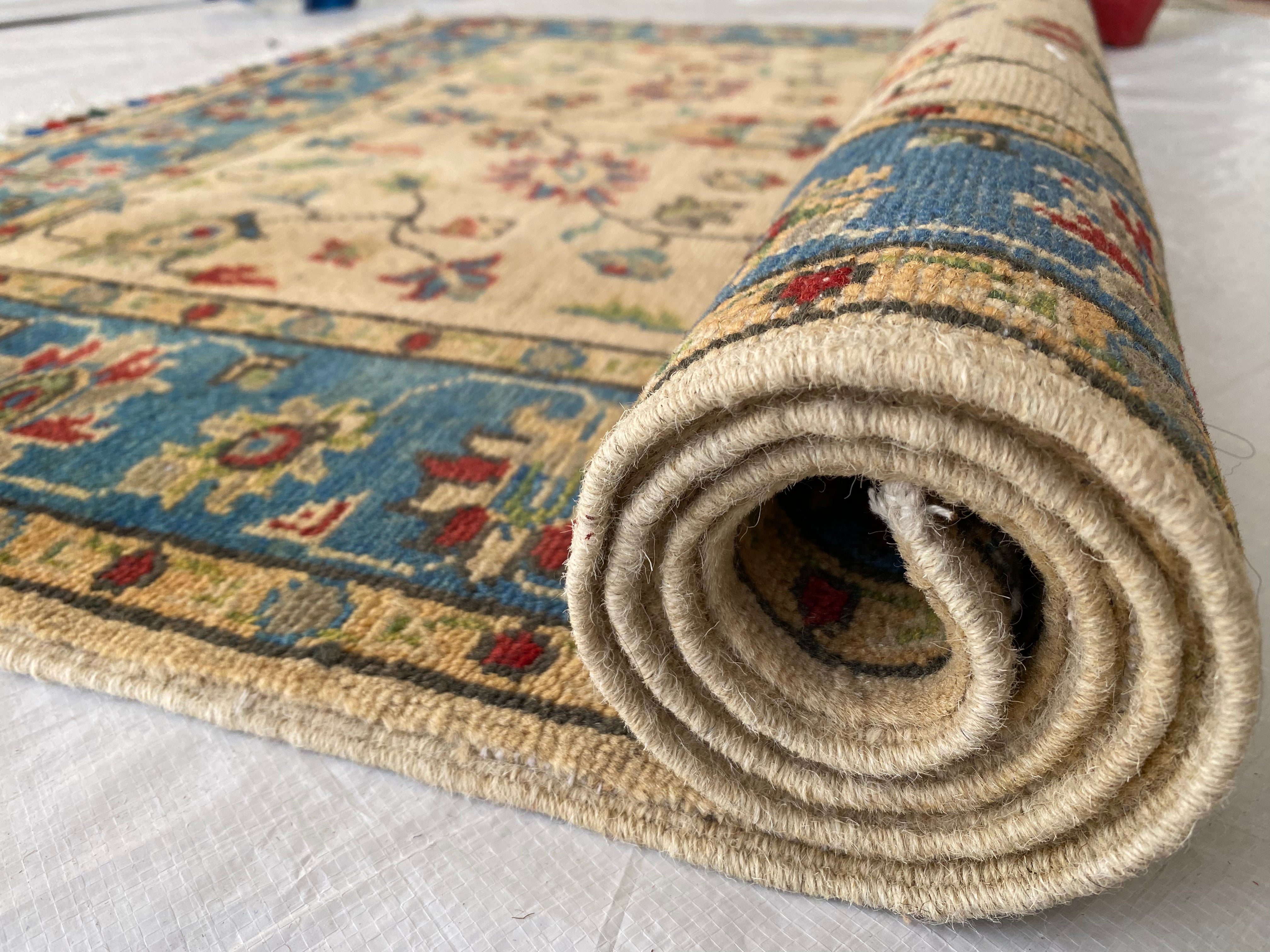 Afghani Rug 4x6 size range tribal Blue Cream laid flat