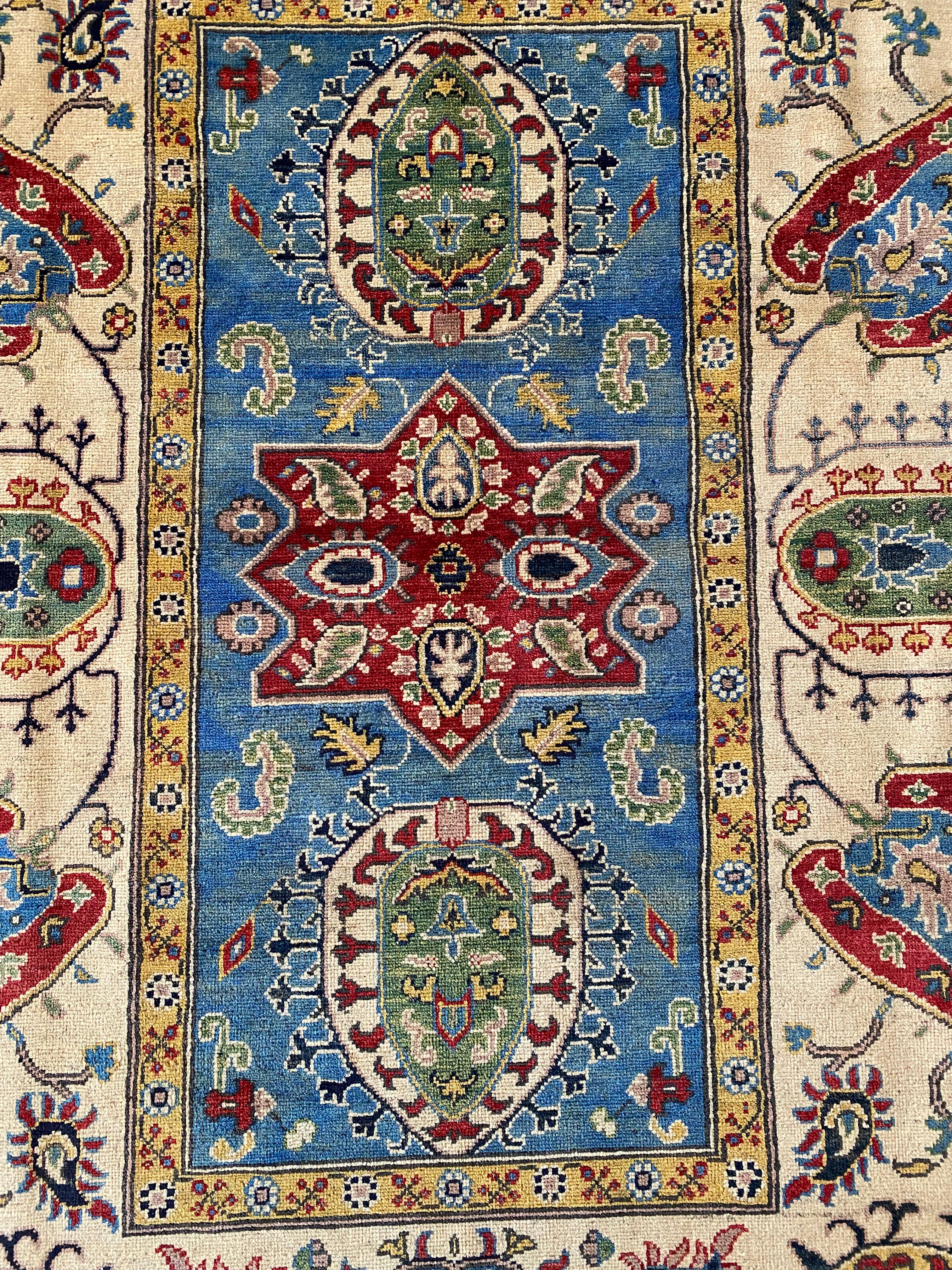 Afghani Rug 6x9 size range floral Blue Cream laid flat