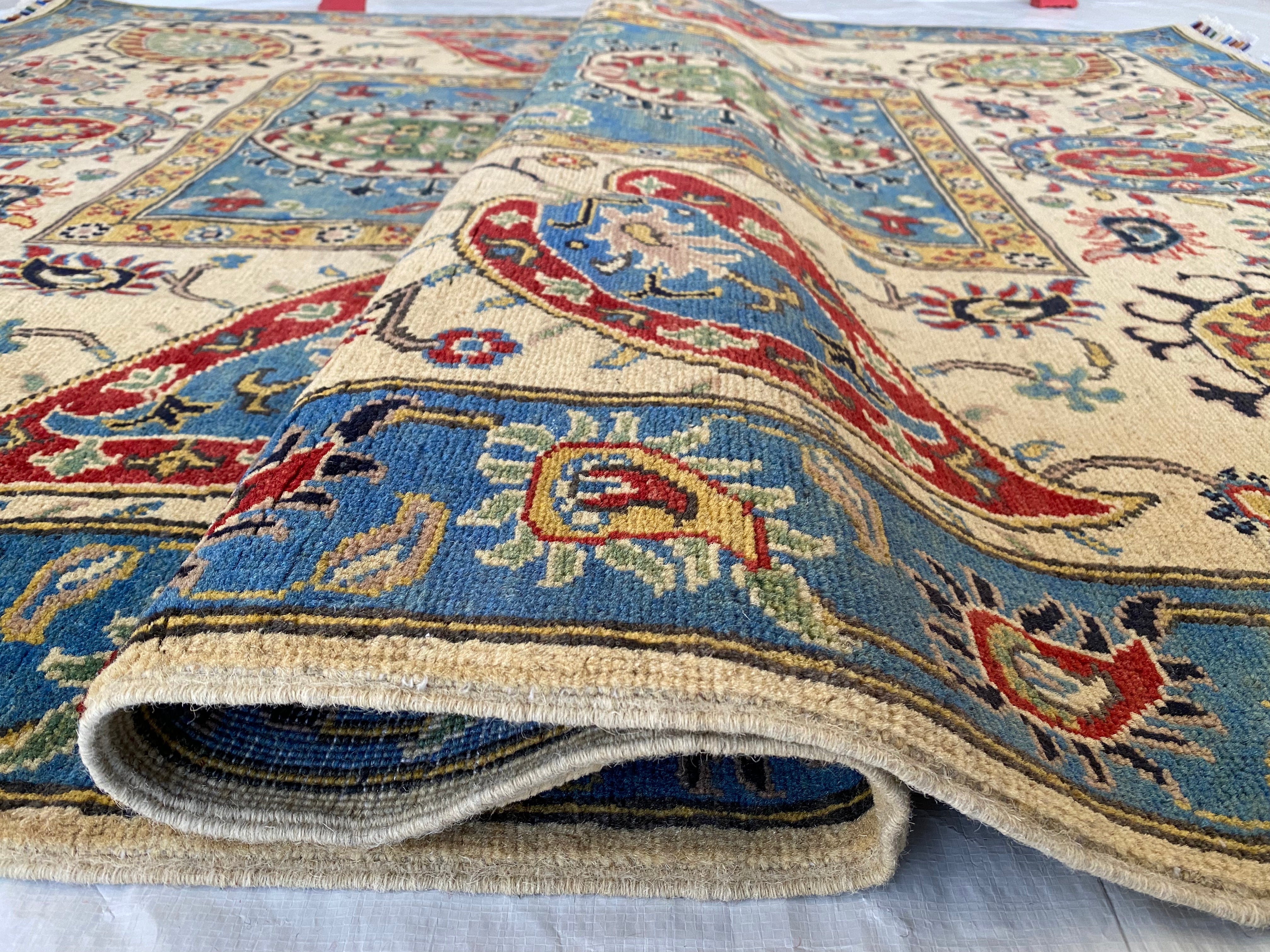 Afghani Rug 6x9 size range floral Blue Cream laid flat