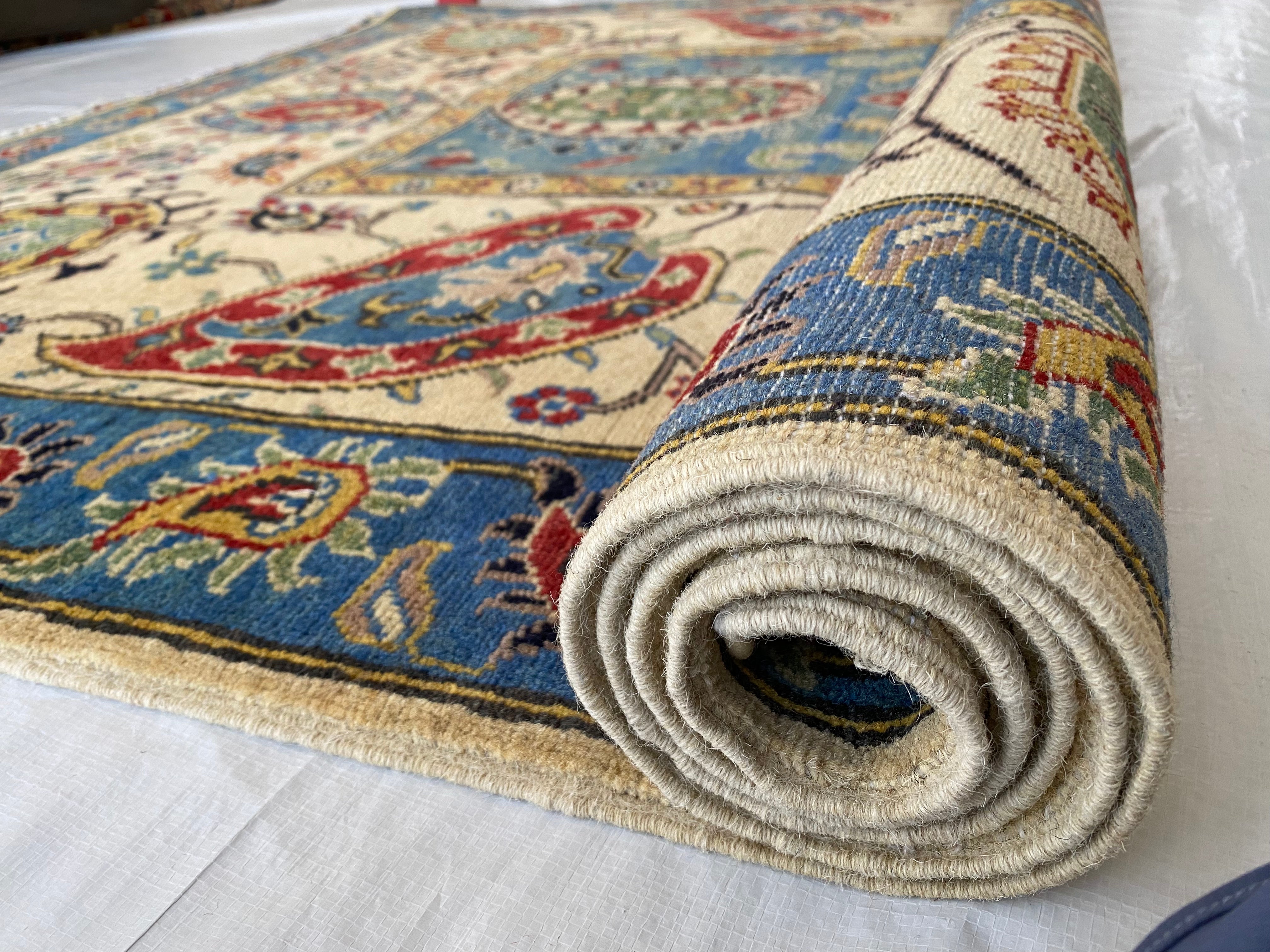 Afghani Rug 6x9 size range floral Blue Cream laid flat