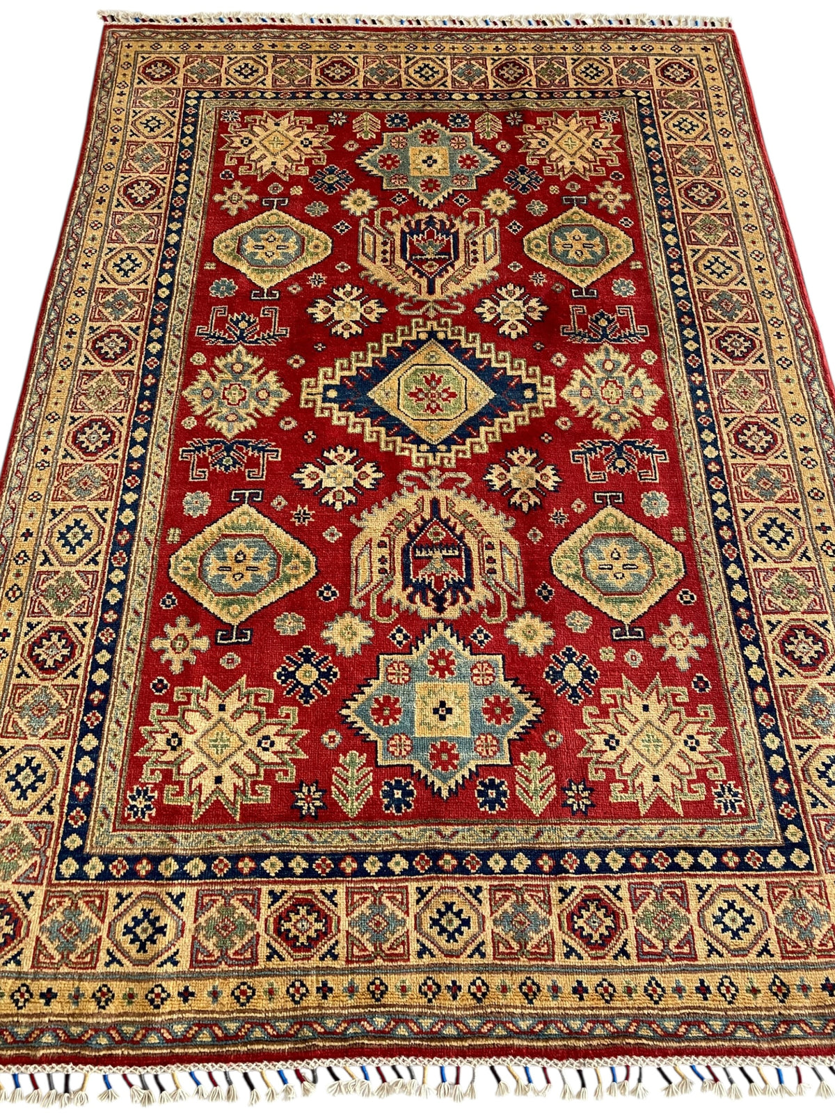 Afghani Rug 5x8 size range tribal Red Cream laid flat