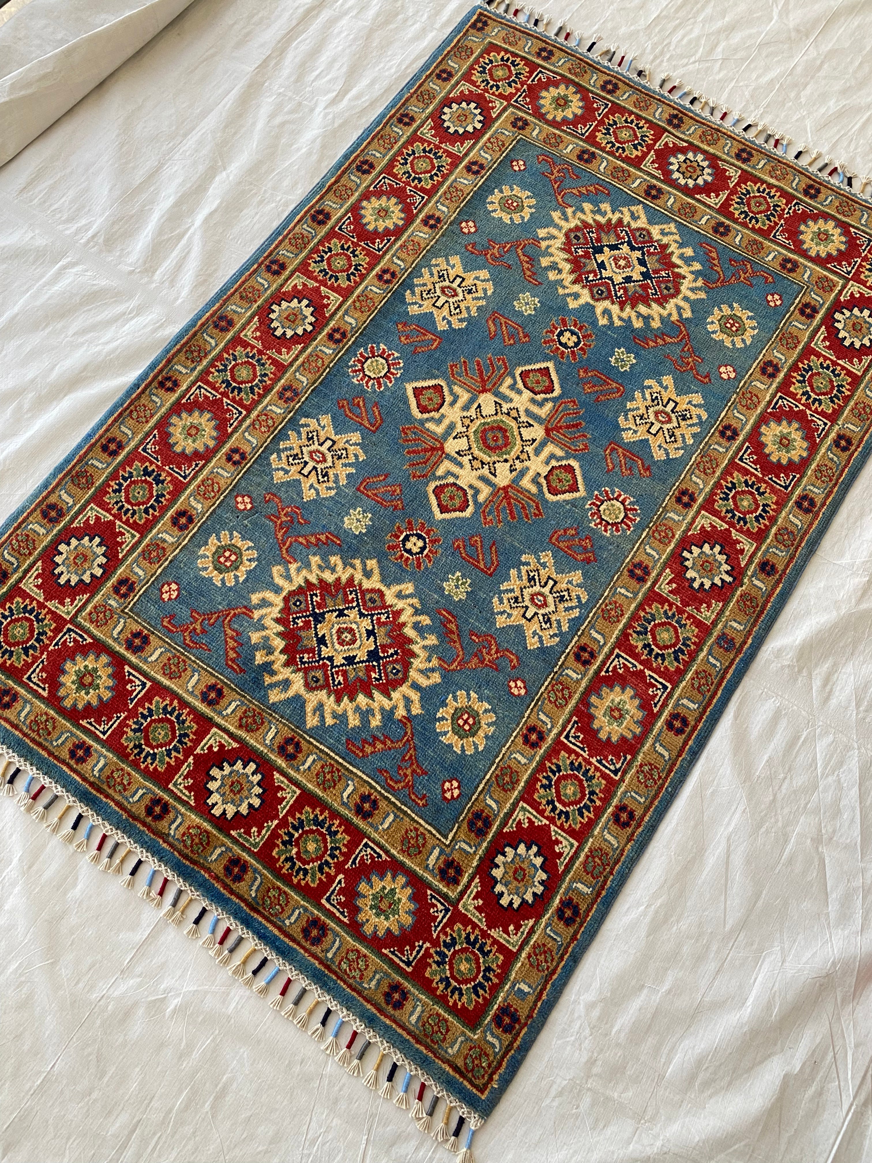 Afghani Rug 4x6 size range tribal Red Blue laid flat