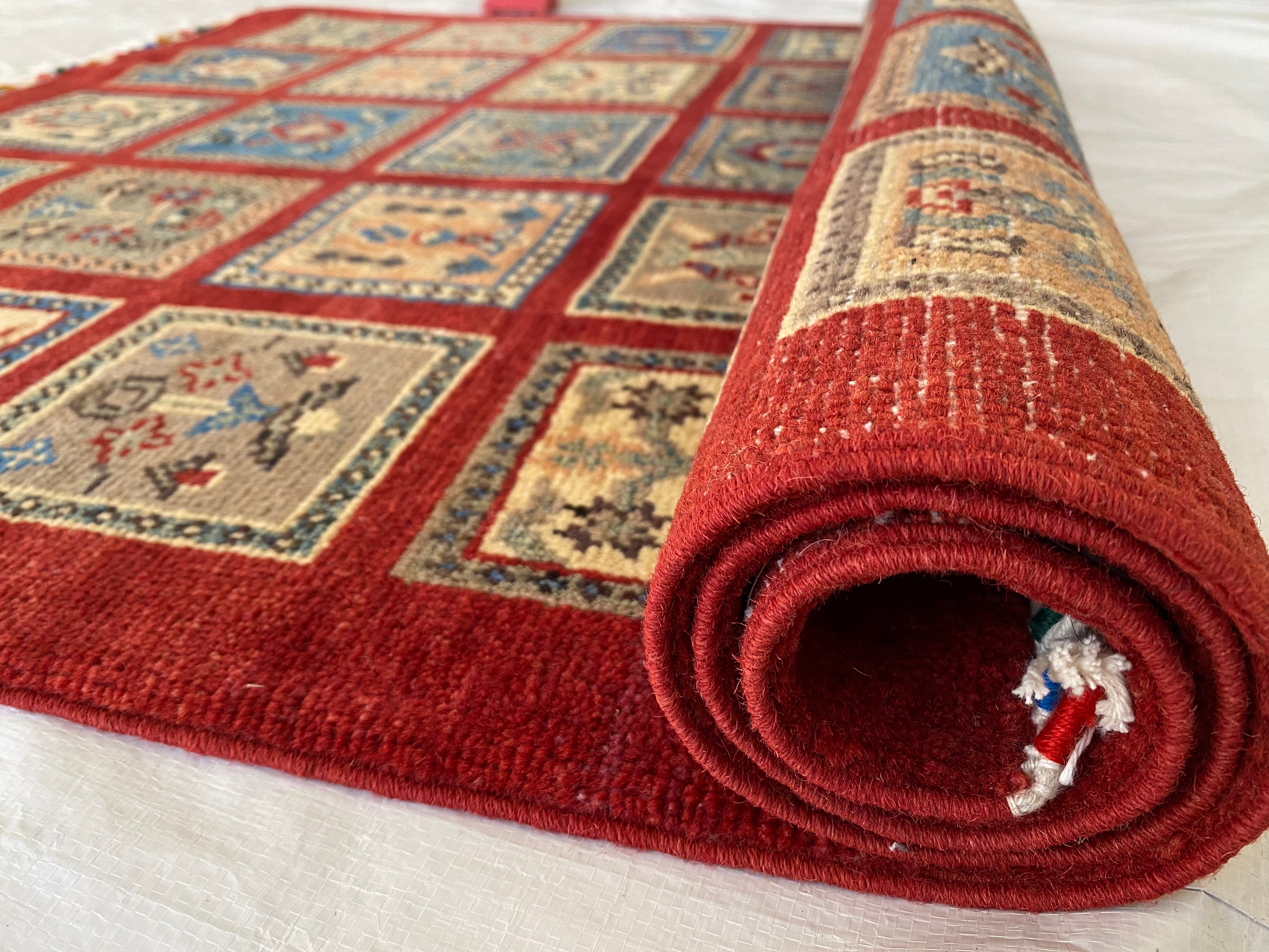 Afghani Rug 4x6 size range tribal Red laid flat