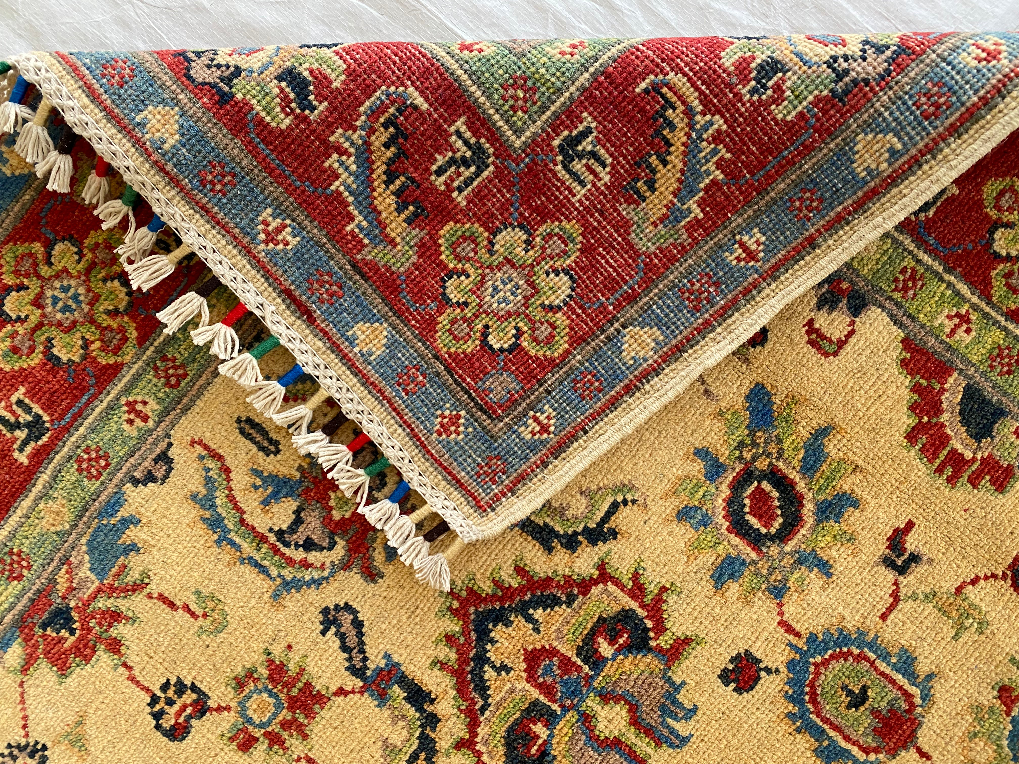 Afghani Rug 4x6 size range floral Red Cream laid flat