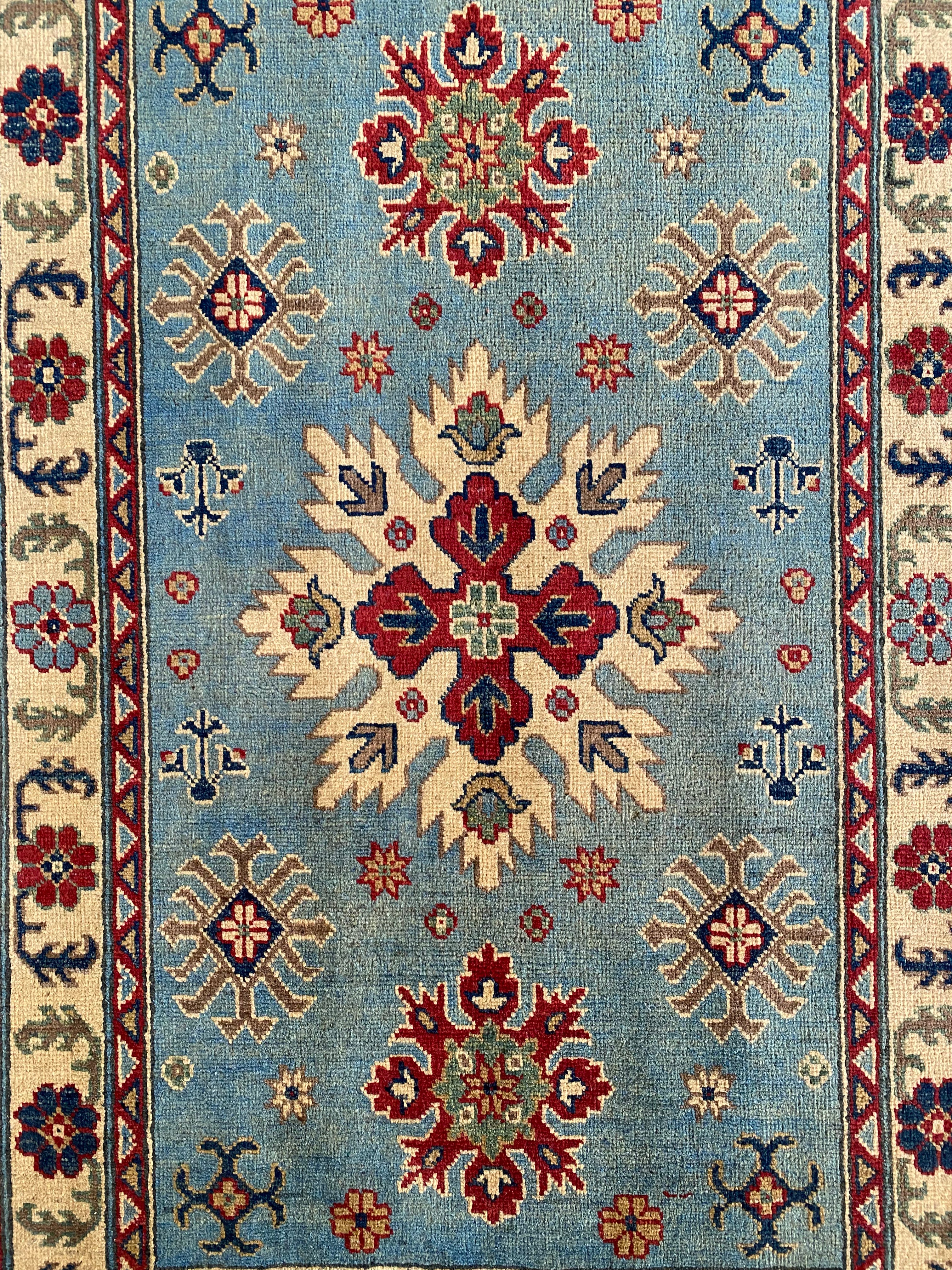 Afghani Rug 4x6 size range tribal Blue Cream laid flat