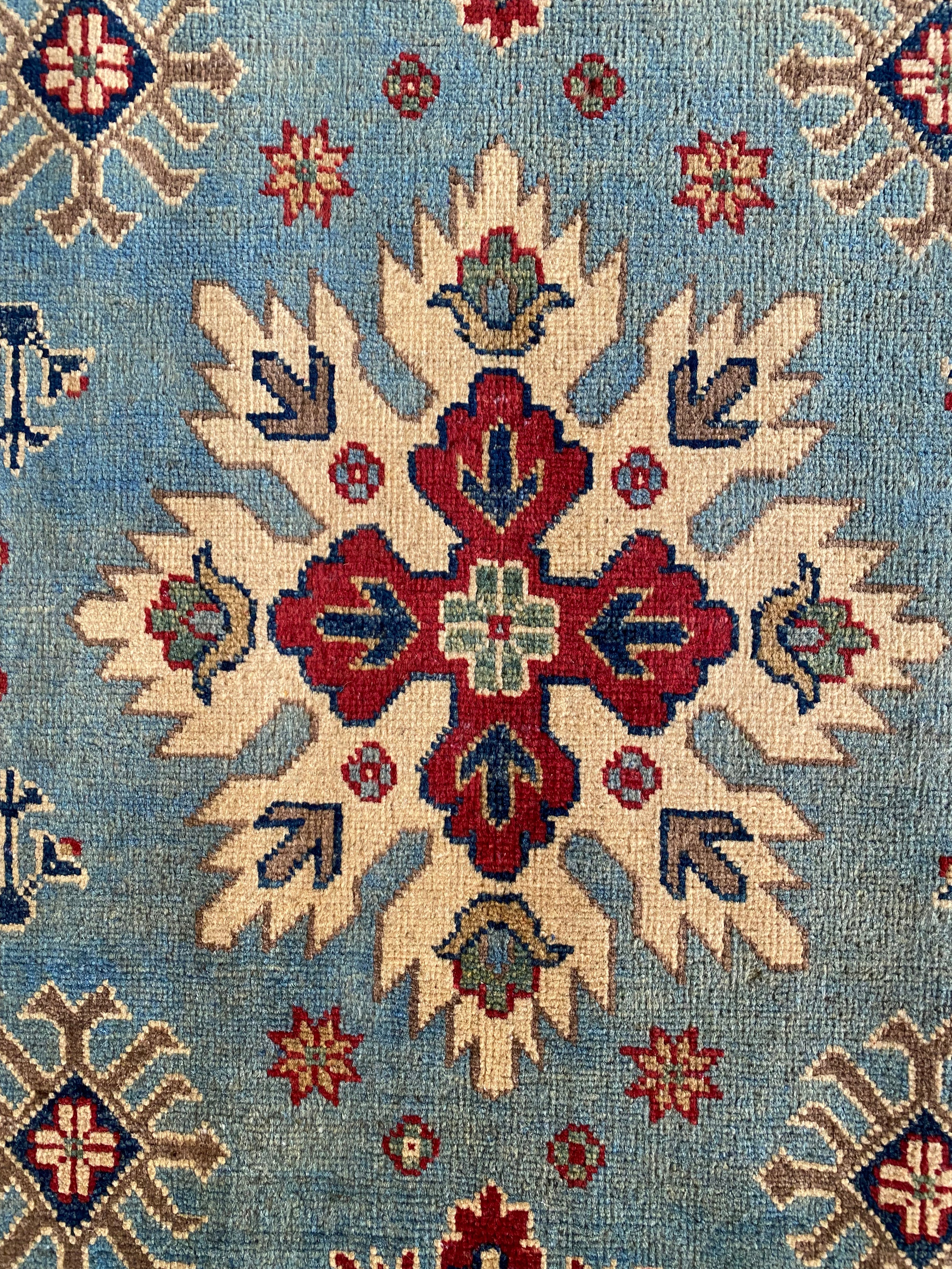 Afghani Rug 4x6 size range tribal Blue Cream laid flat