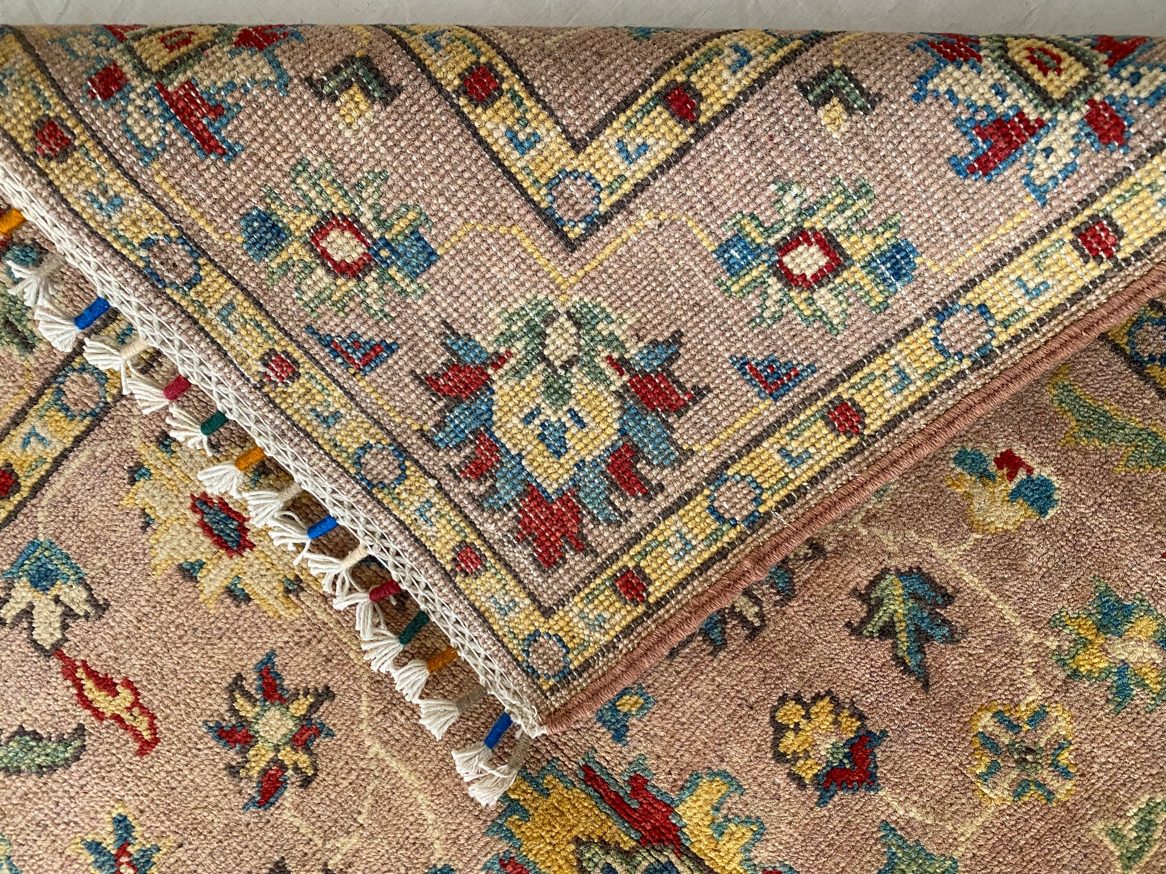 Afghani Rug 4x6 size range tribal Pink laid flat