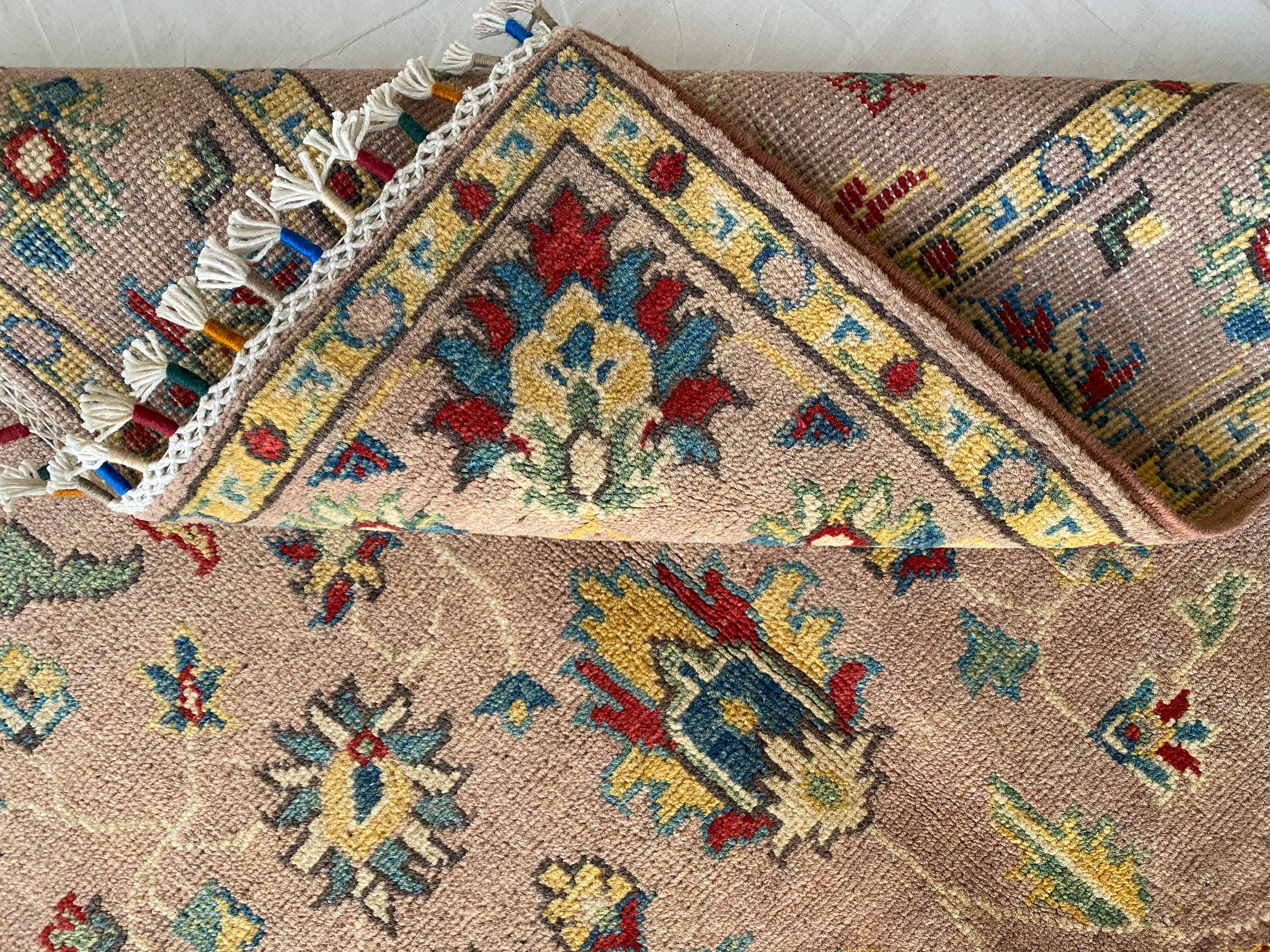 Afghani Rug 4x6 size range tribal Pink laid flat