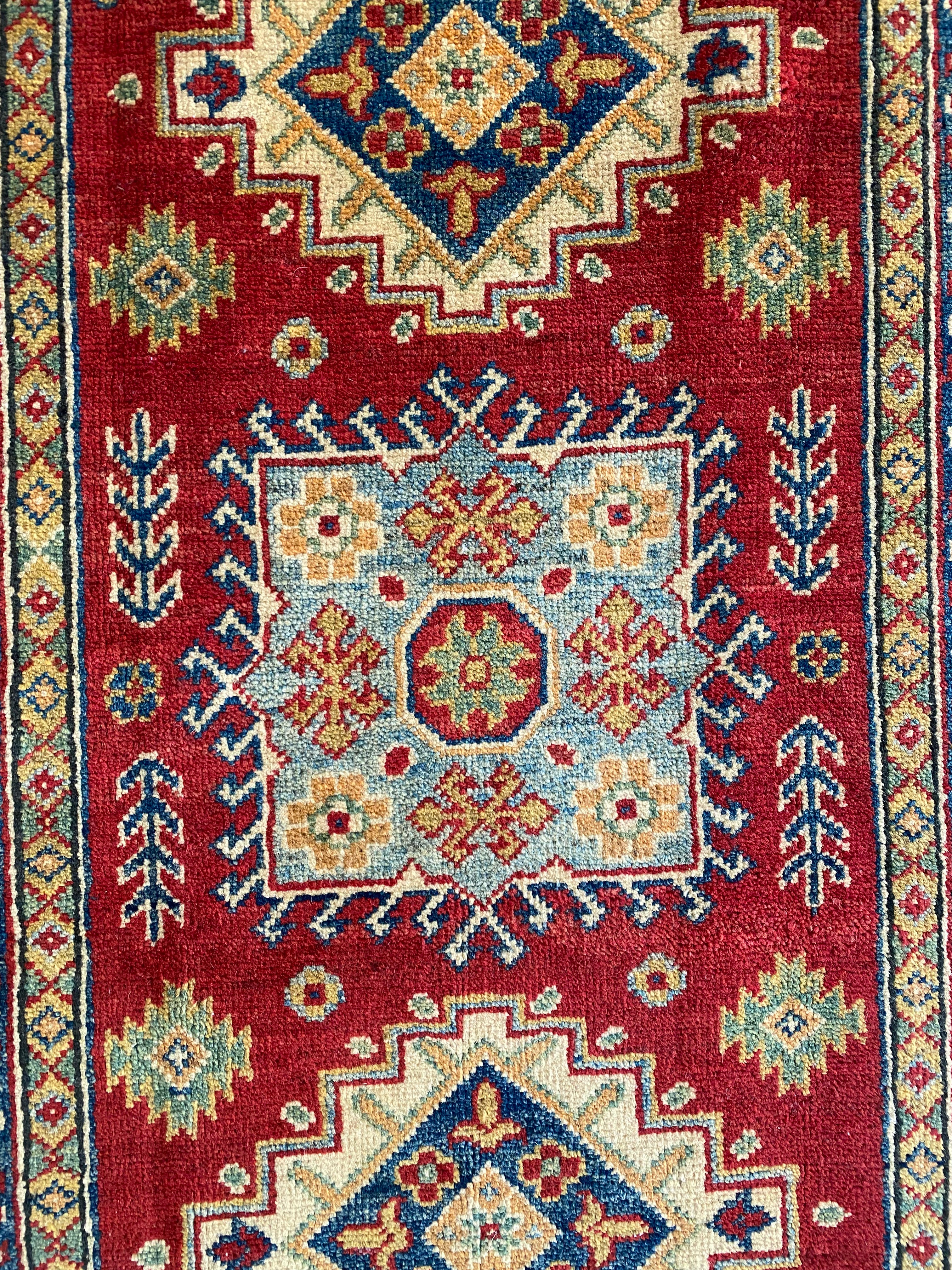 Afghani Rug 4x6 size range tribal Red Cream laid flat