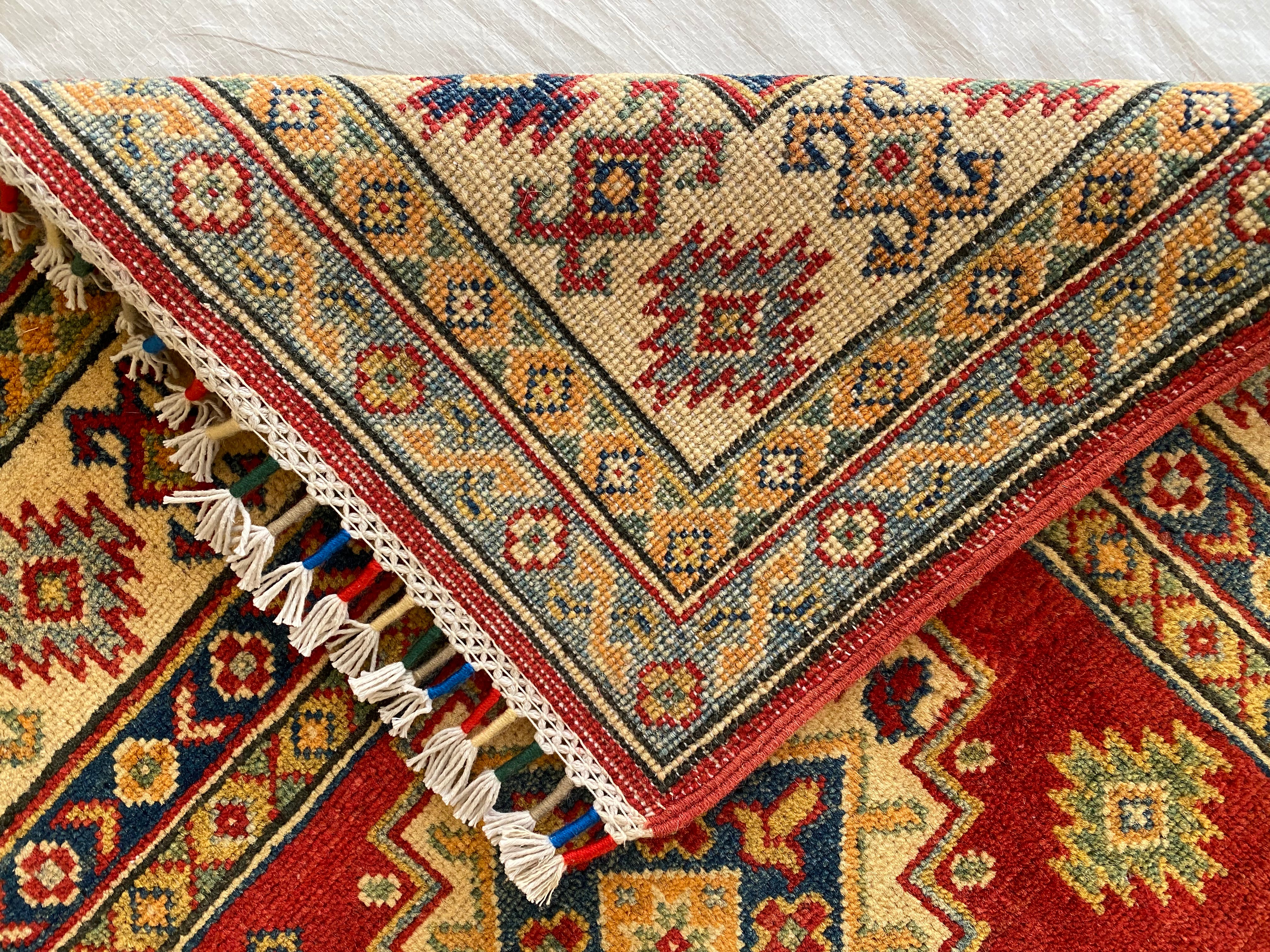 Afghani Rug 4x6 size range tribal Red Cream laid flat