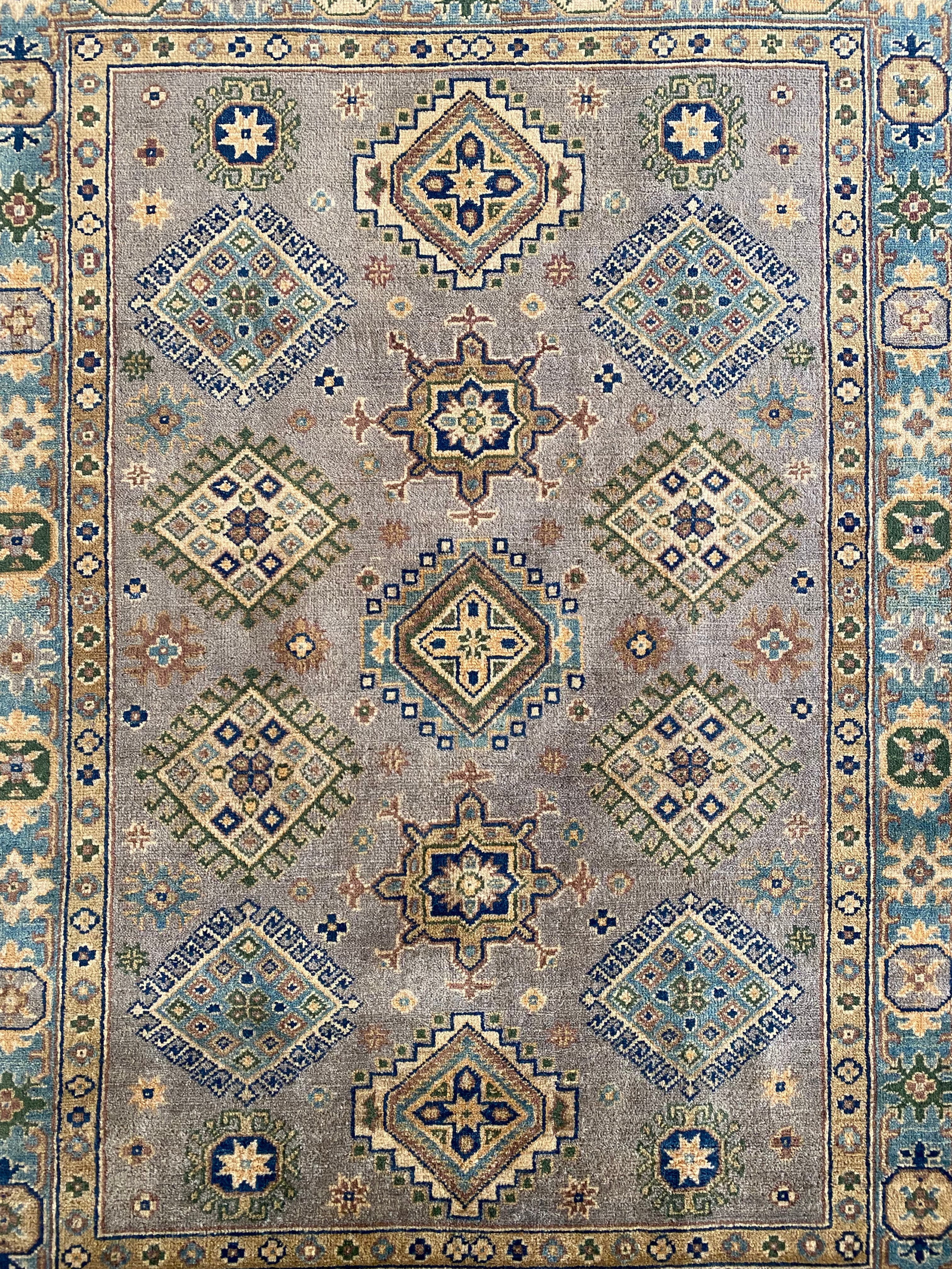 Afghani Rug 5x8 size range tribal laid flat