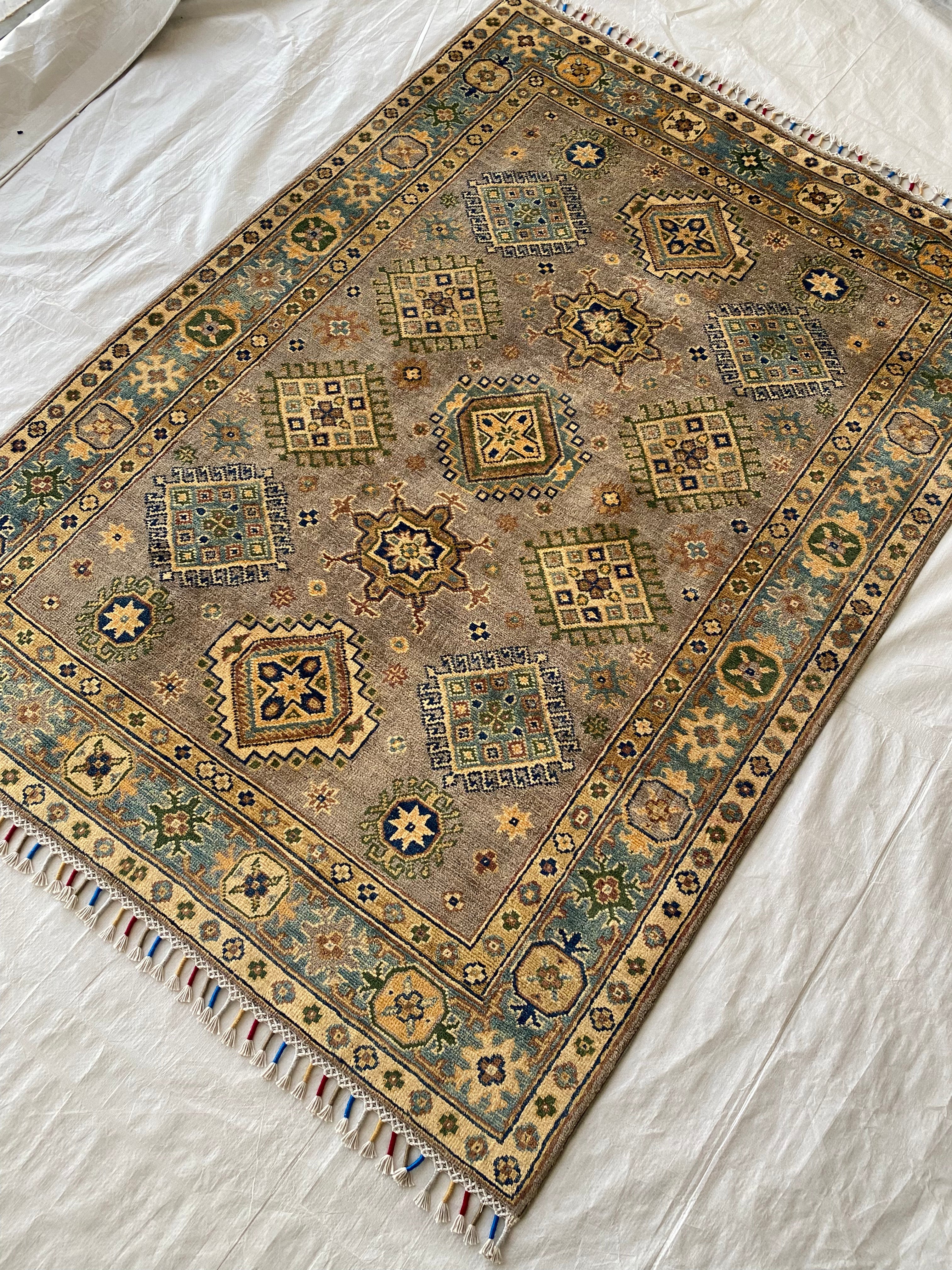 Afghani Rug 5x8 size range tribal laid flat