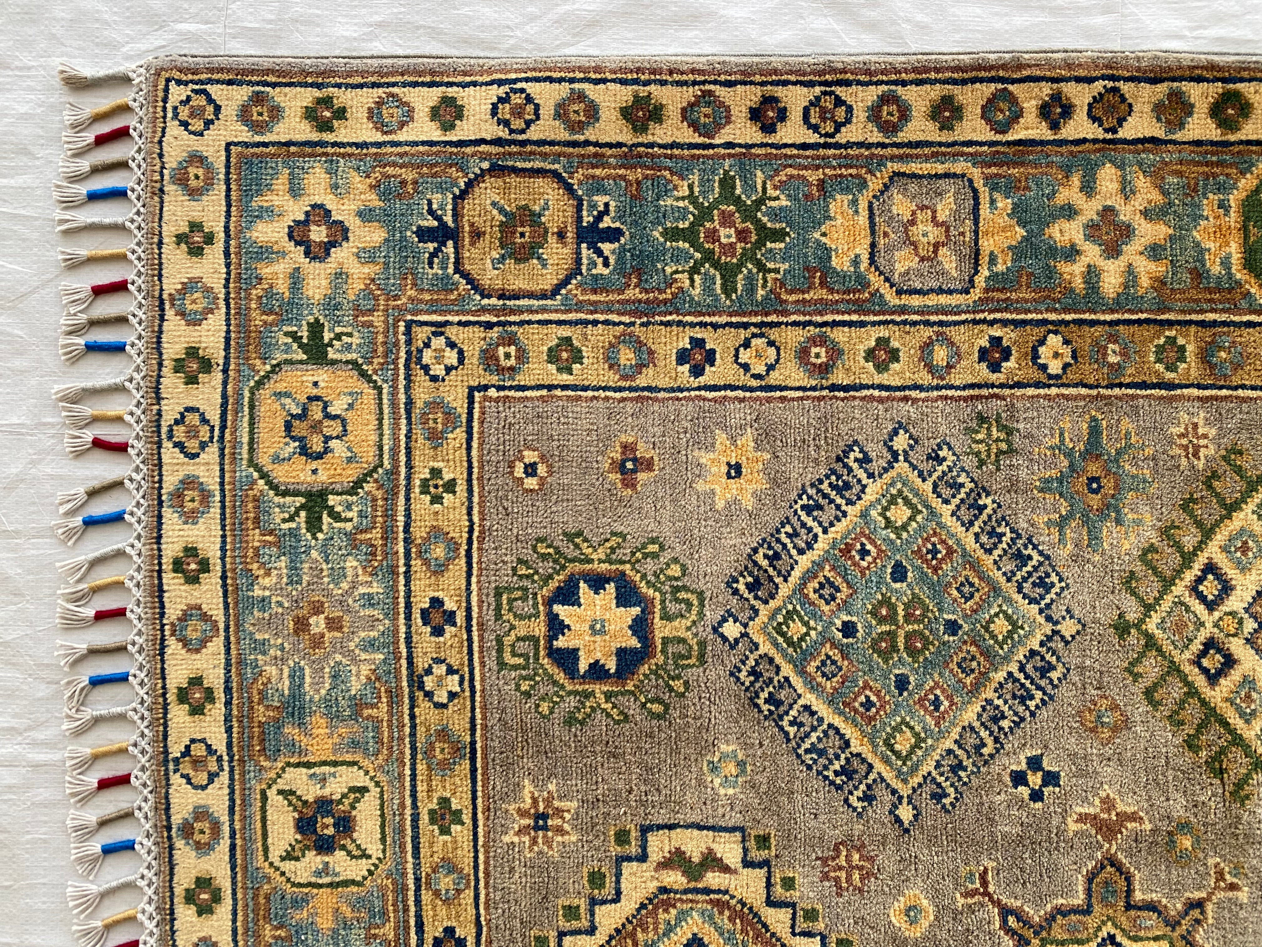 Afghani Rug 5x8 size range tribal laid flat