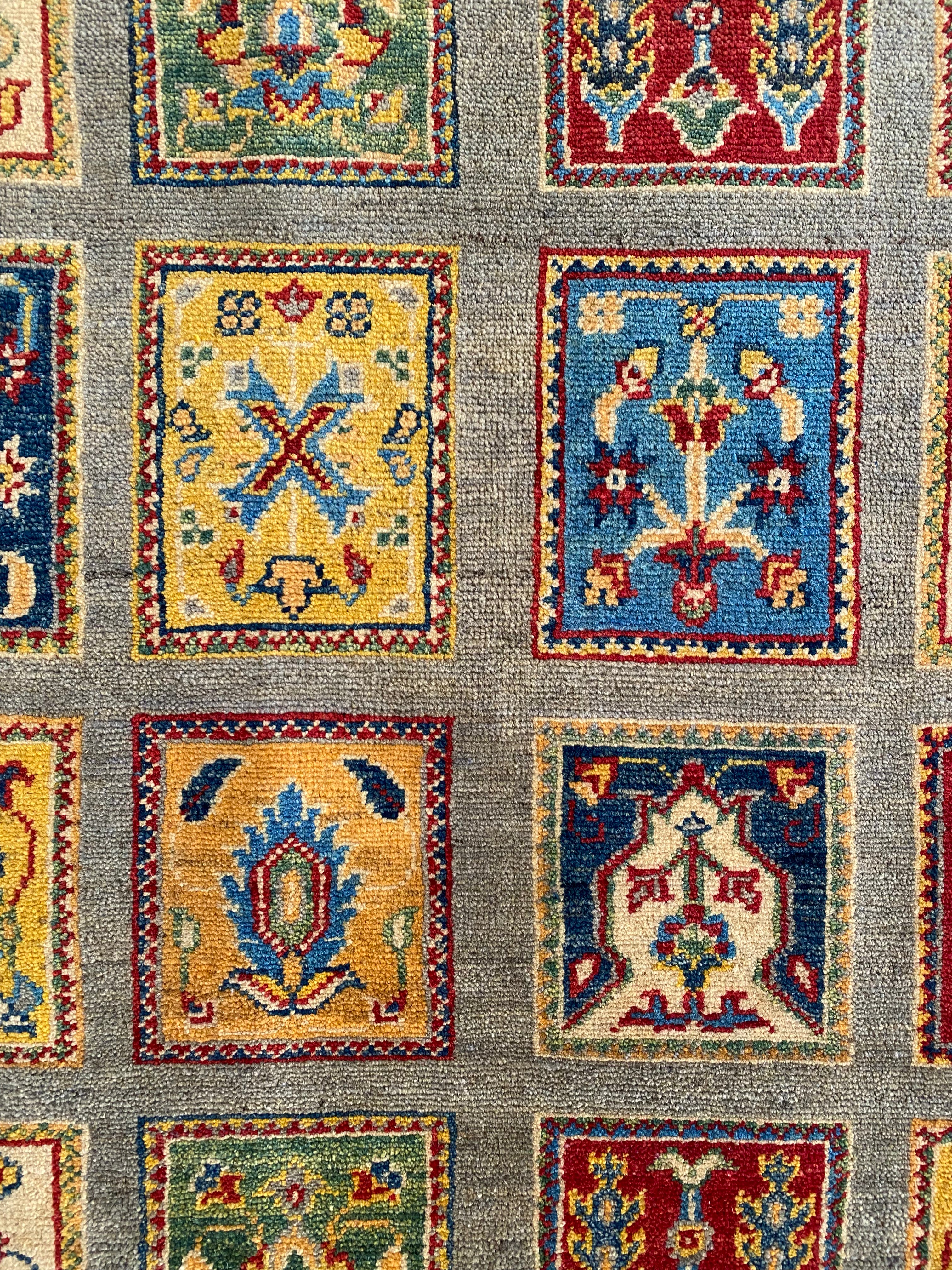 Afghani Rug 5x8 size range tribal Brown laid flat