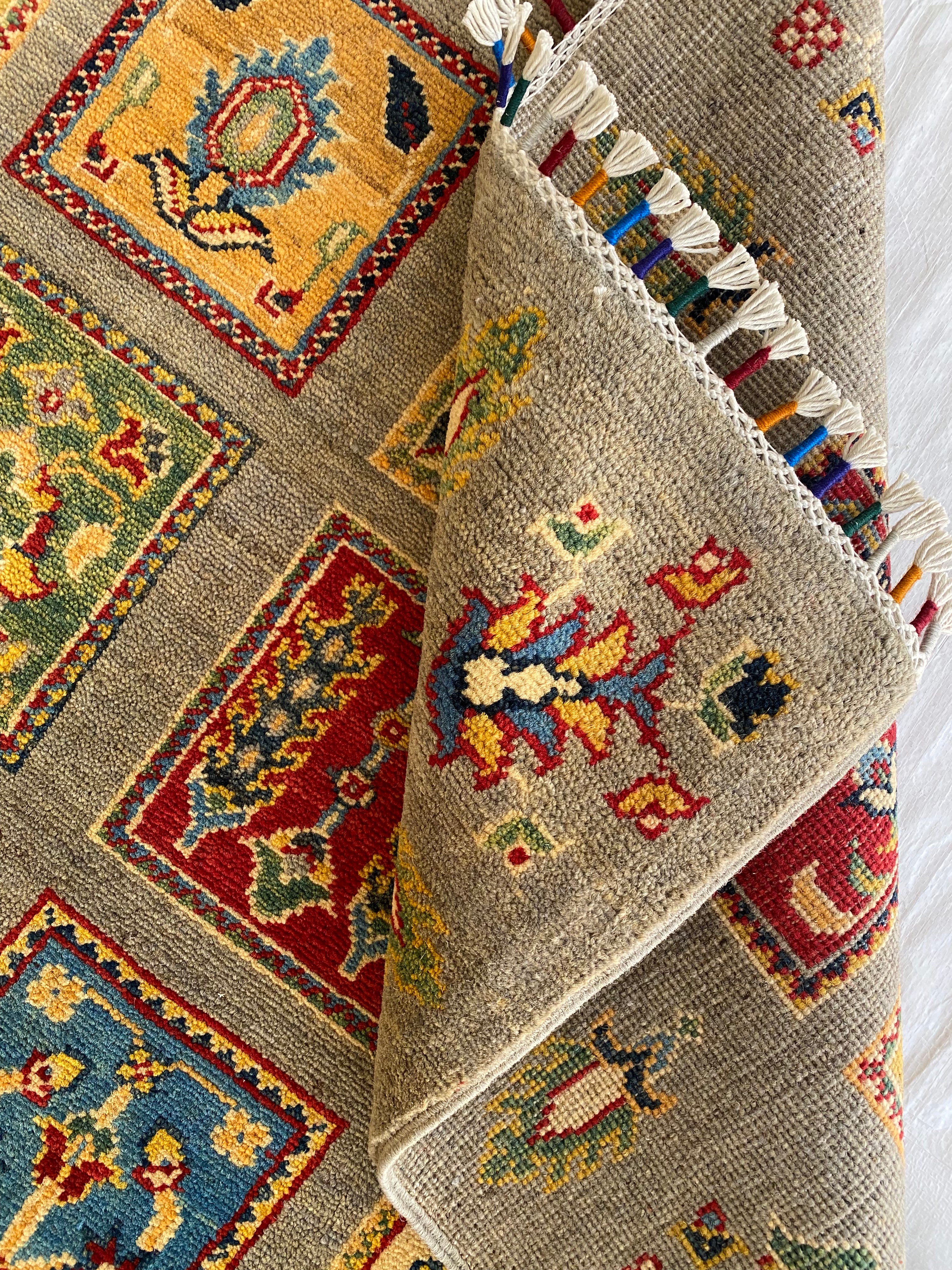 Afghani Rug 5x8 size range tribal Brown laid flat