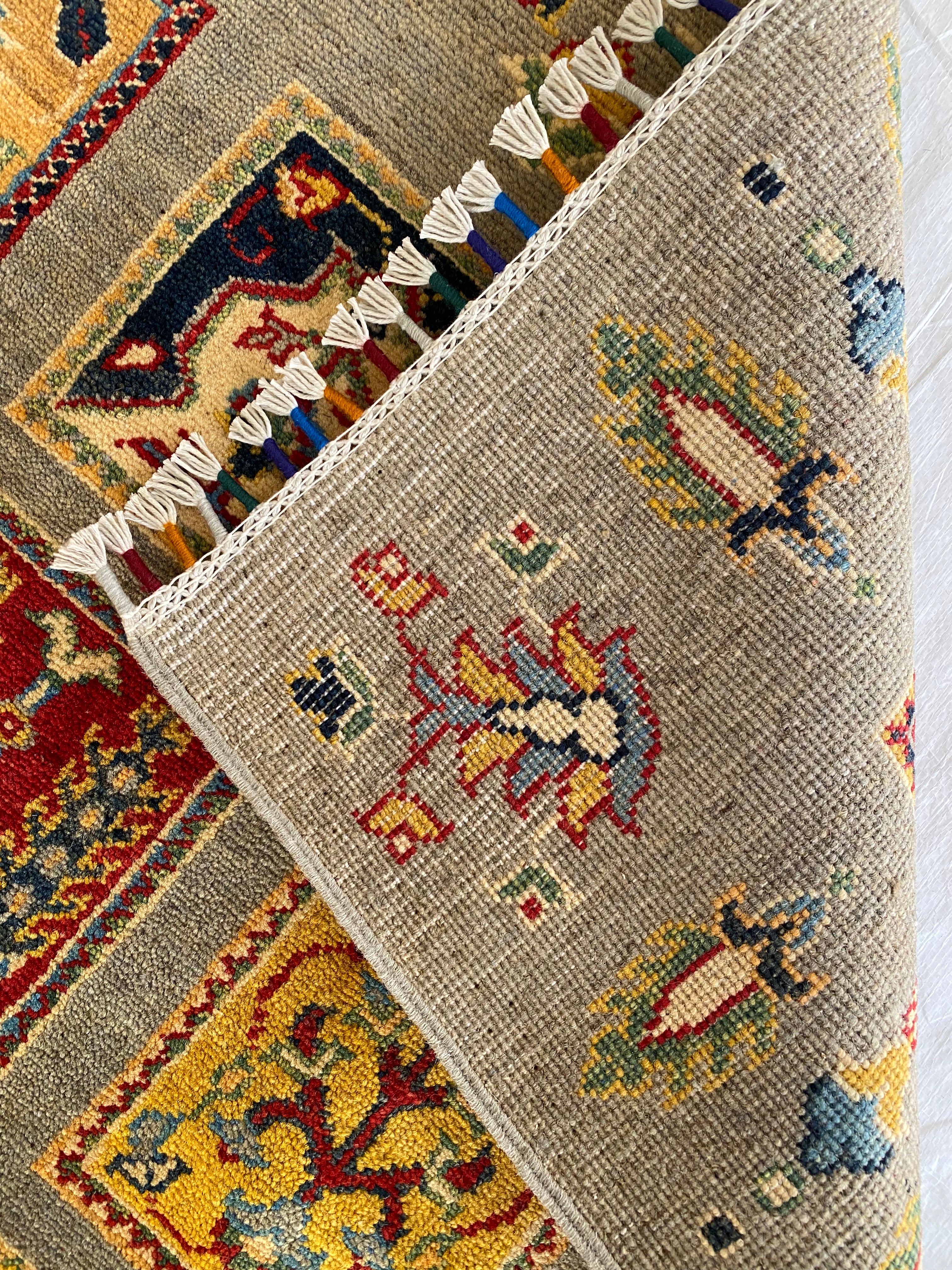 Afghani Rug 5x8 size range tribal Brown laid flat