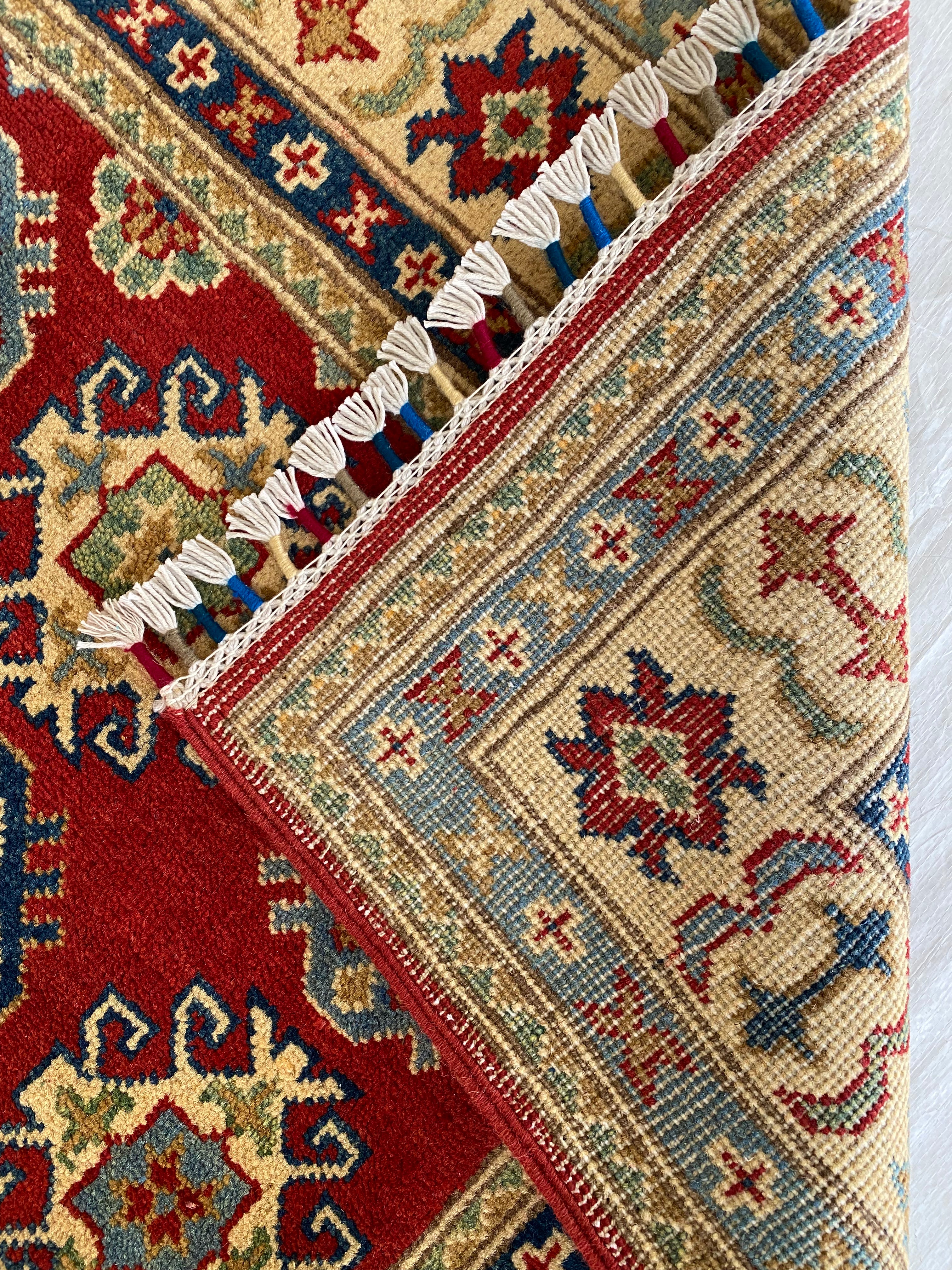 Afghani Rug 4x6 size range tribal Red Cream laid flat