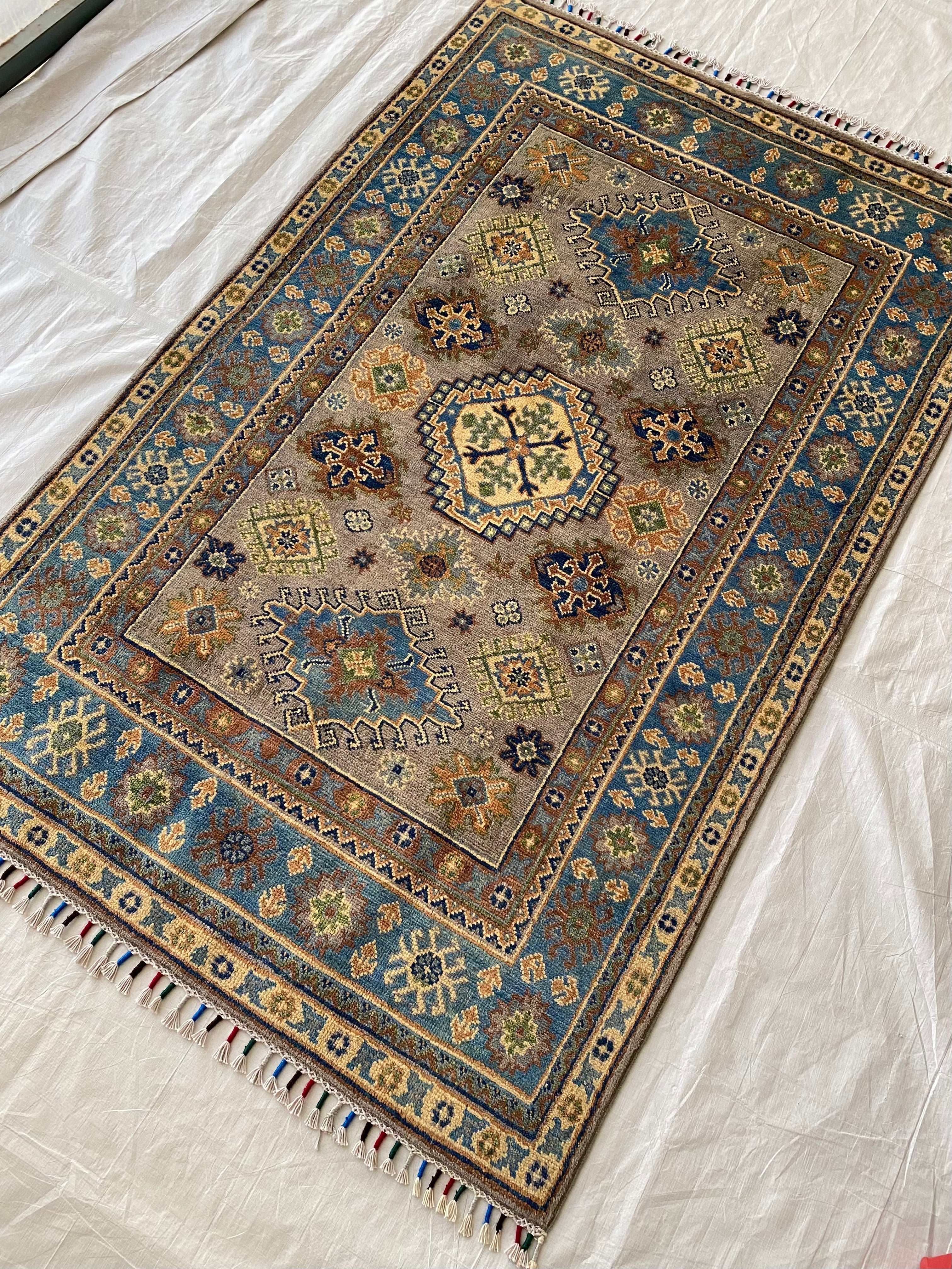 Afghani Rug 4x6 size range tribal Blue laid flat