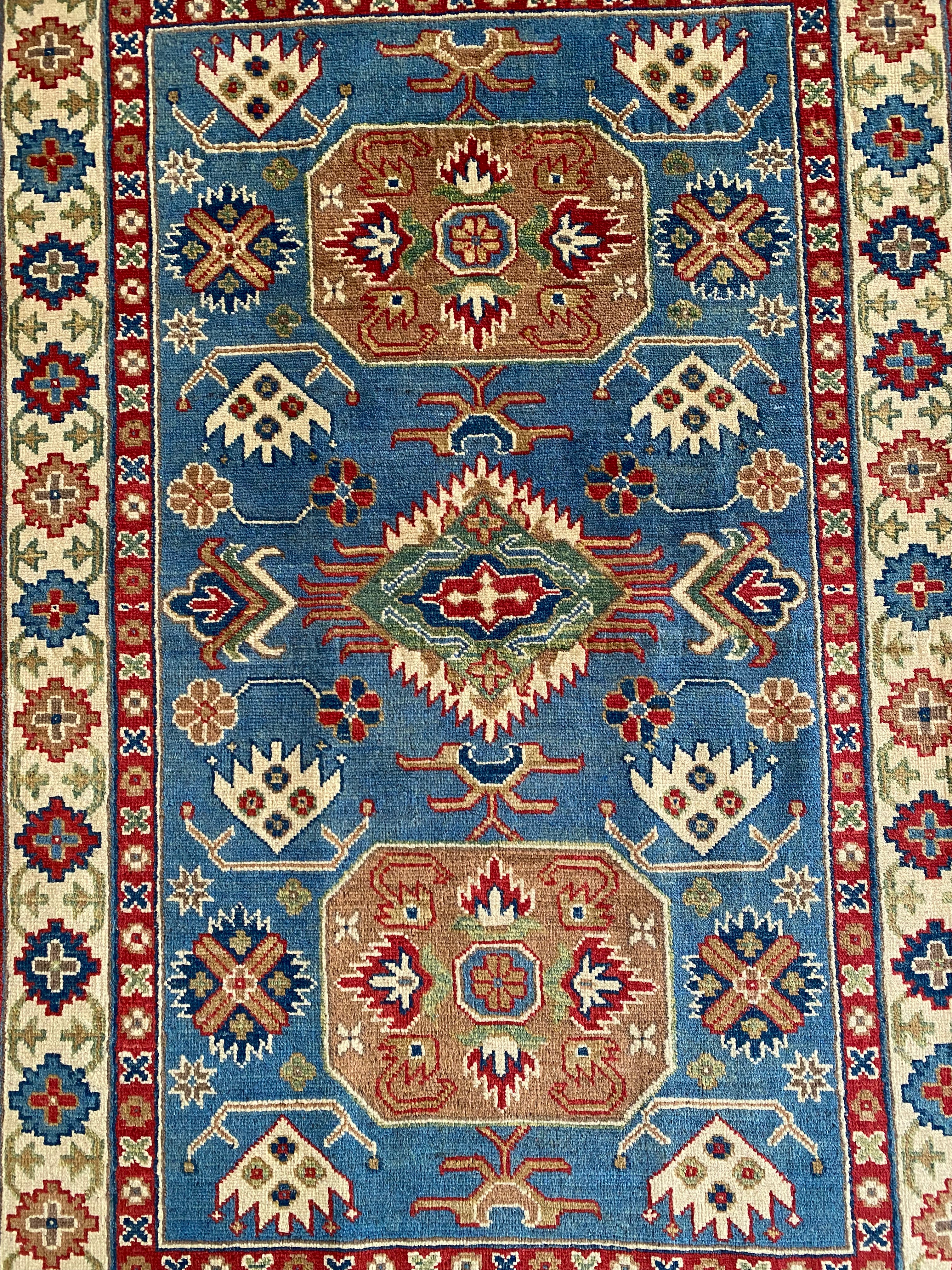 Afghani Rug 4x6 size range tribal Blue Cream laid flat