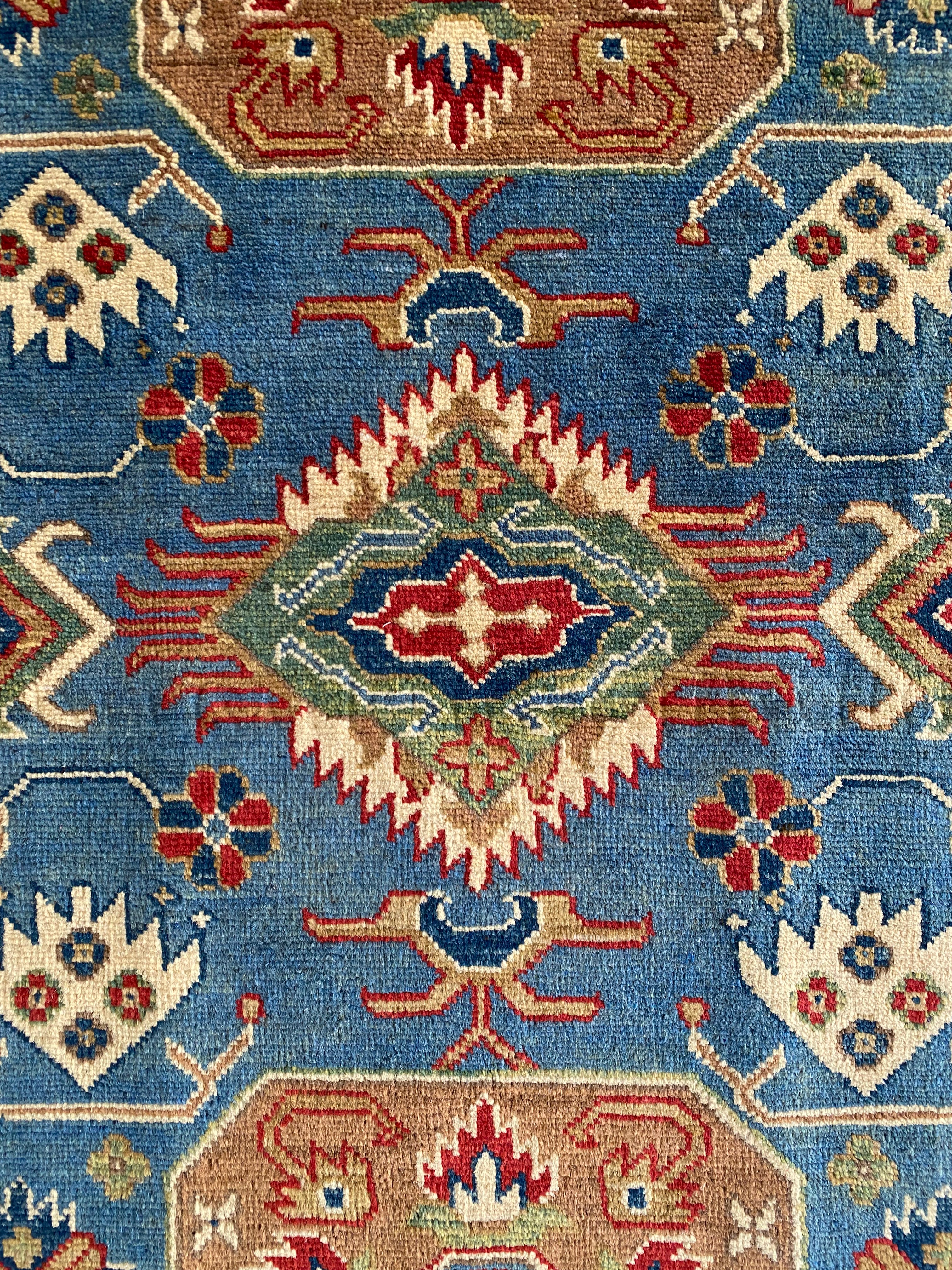 Afghani Rug 4x6 size range tribal Blue Cream laid flat