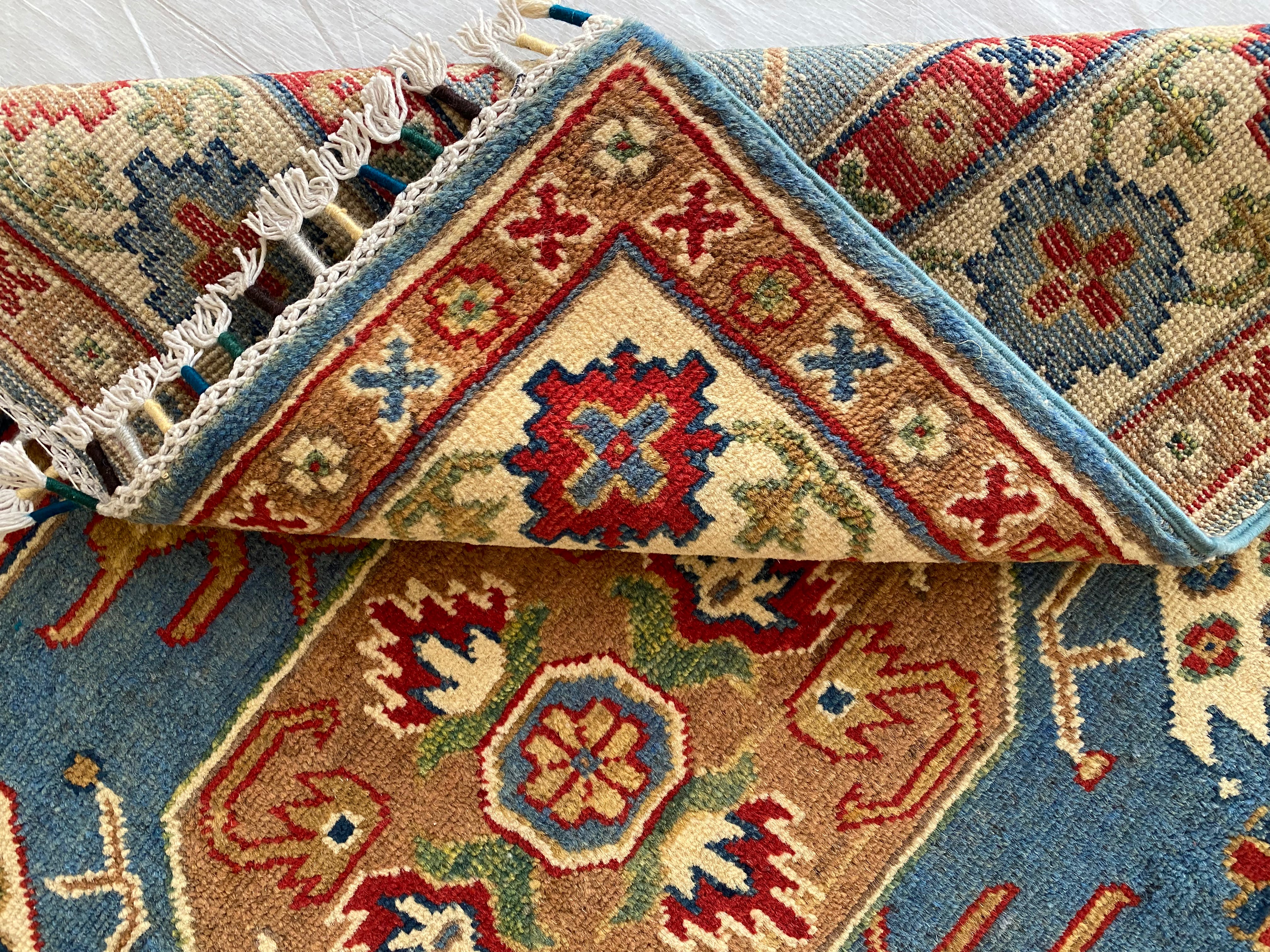 Afghani Rug 4x6 size range tribal Blue Cream laid flat