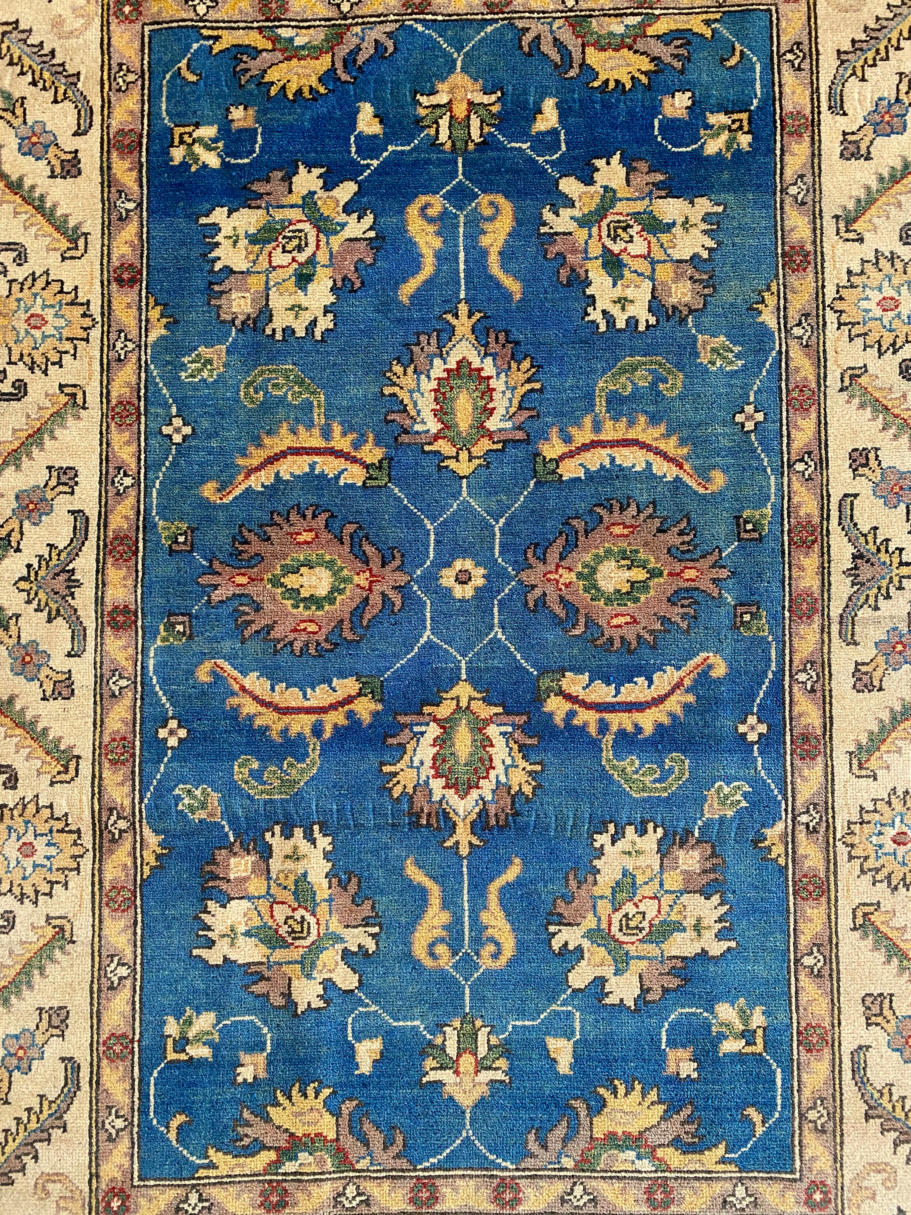Afghani Rug 4x6 size range tribal Blue Cream laid flat